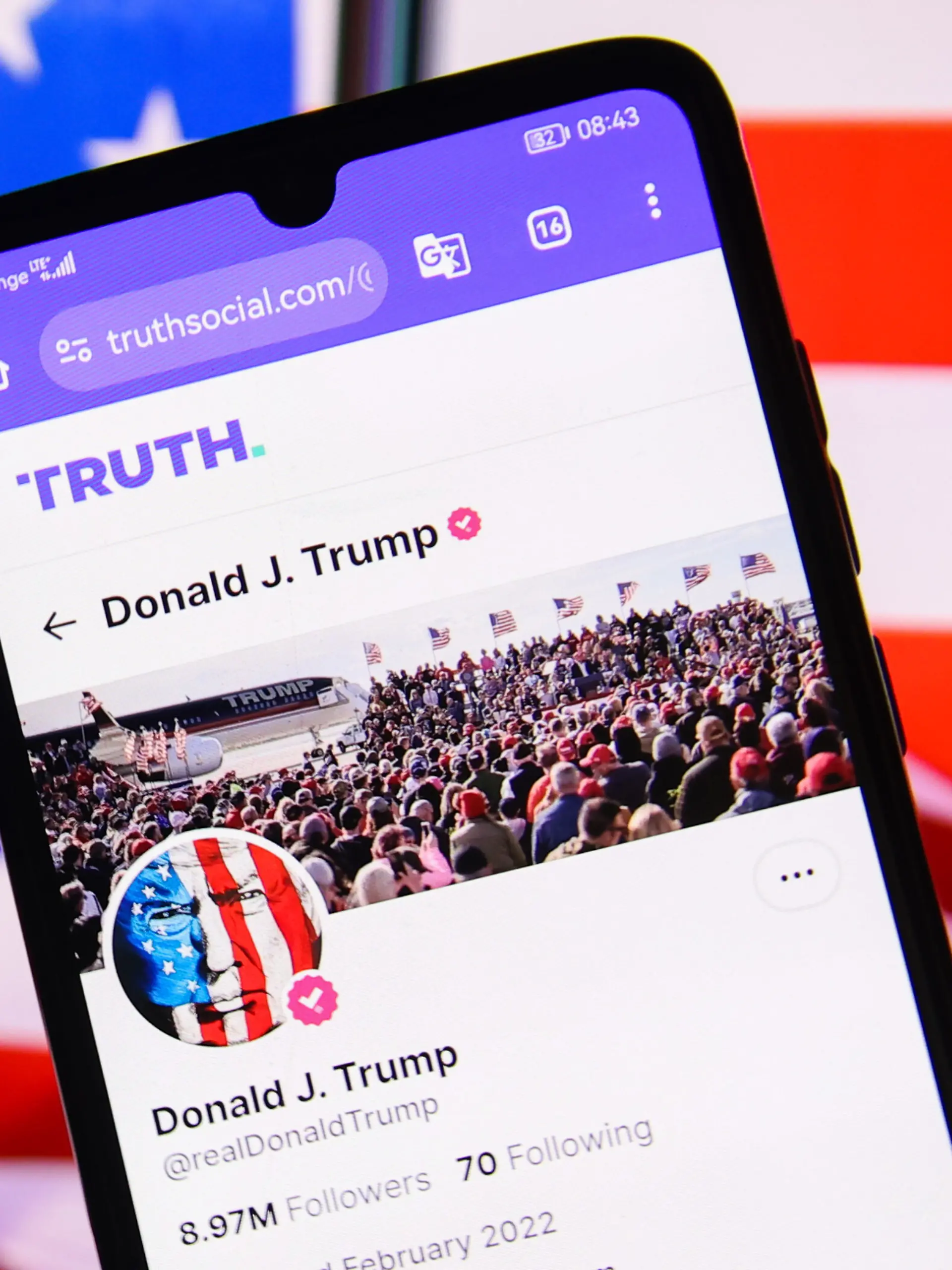 US President Donald J. Trump official 'Truth' account is displayed on a mobile phone screen with U.S. flag in the background for illustration photo. Krakow, Poland on February 20th, 2025. (Photo by Beata Zawrzel/NurPhoto)