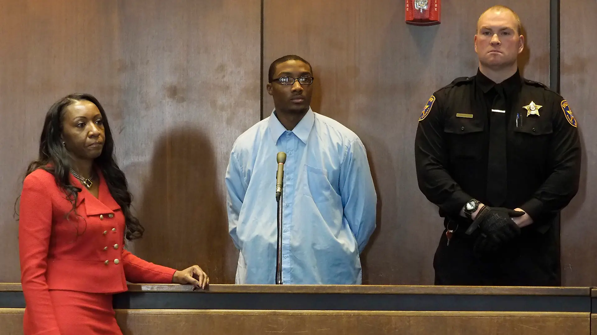 Defense attorney Shevelle McPherson, left, stands next to her client, Khalil Wheeler-Weaver, 20, of Orange, center, as Wheeler-Weaver appears in Superior Court in Newark to be arraigned for the murder of Robin West, 19 of Philadelphia. Wheeler-Weaver previously pleaded not guilty to the strangling deaths of Joanne Browne, 33, and Sarah Butler, 20. March 13, 2017 (Patti Sapone/NJ Advance Media via AP, Pool)