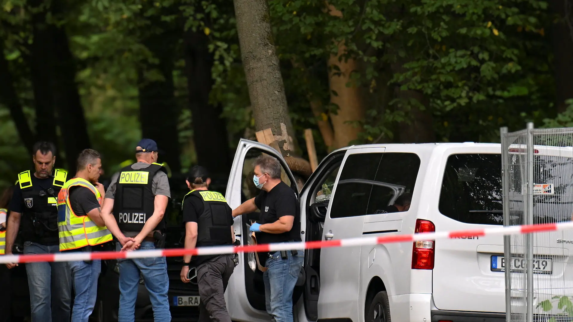 Police inspect a vehicle which crashed into a crowd near Berlin's annual Christopher Street Day Pride parade on Saturday evening, leaving multiple people injured and the parade called off, in Berlin, Germany, July 26, 2026. REUTERS/Annegret Hilse