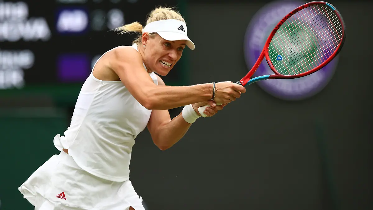 LONDON, ENGLAND - JULY 06: Angelique Kerber of Germany plays a backhand in her Ladies' Singles Quarter-Final match against Karolina Muchova of The Czech Republic during Day Eight of The Championships - Wimbledon 2021 at All England Lawn Tennis and Croquet Club on July 06, 2021 in London, England. (Photo by Julian Finney/Getty Images)
