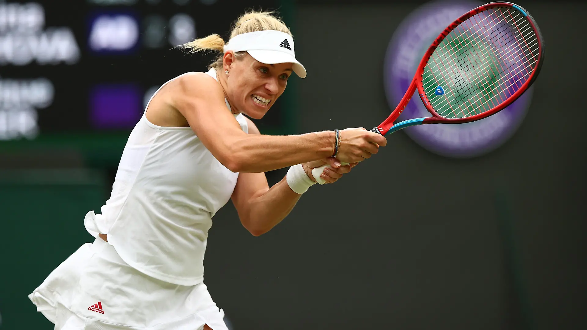 LONDON, ENGLAND - JULY 06: Angelique Kerber of Germany plays a backhand in her Ladies' Singles Quarter-Final match against Karolina Muchova of The Czech Republic during Day Eight of The Championships - Wimbledon 2021 at All England Lawn Tennis and Croquet Club on July 06, 2021 in London, England. (Photo by Julian Finney/Getty Images)