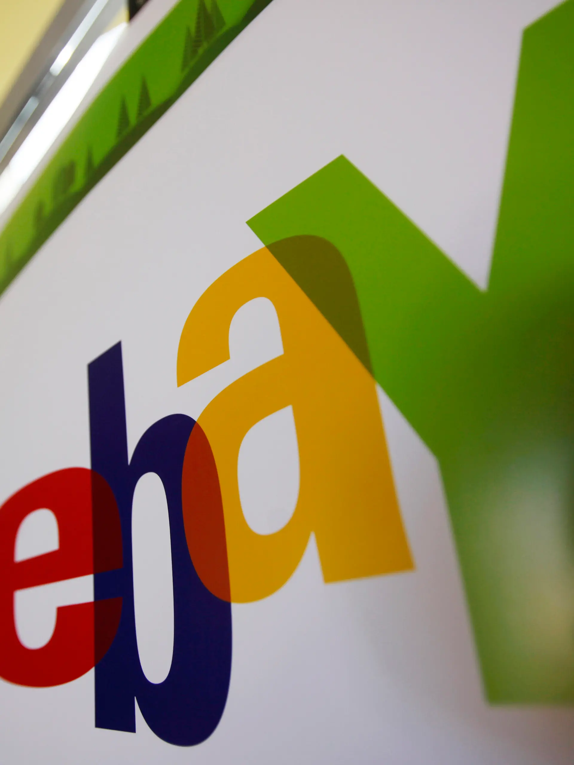 FILE - In this Feb. 24, 2010 file photo, an eBay logo is seen at their offices in San Jose, Calif. A Massachusetts couple subjected to threats and other bizarre harassment from former eBay Inc. employees filed a civil lawsuit against the Silicon Valley giant on Wednesday, July 21, 2021. David and Ina Steiner say in their lawsuit filed in Boston federal court that the company engaged in a conspiracy to “intimidate, threaten to kill, torture, terrorize, stalk and silence them” in order to “stifle their reporting on eBay.” (AP Photo/Paul Sakuma, File)