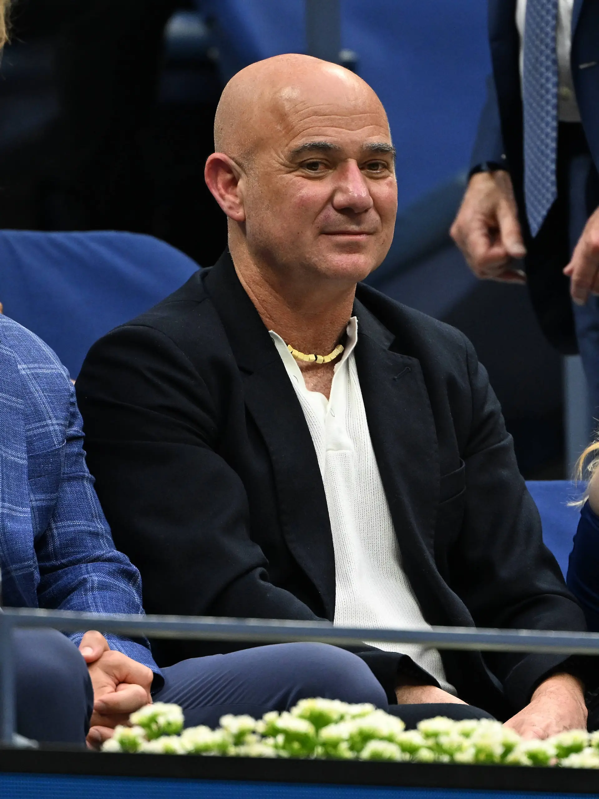 FLUSHING NY- AUGUST 24: Andre Agassi and his daughter Jaz Ella Agassi are seen watching Novak Djokovic Vs Learner Tien on Louis Armstrong Stadium at the USTA Billie Jean King National Tennis Center on August 24, 2025 in Flushing Queens. Copyright: xmpi04x