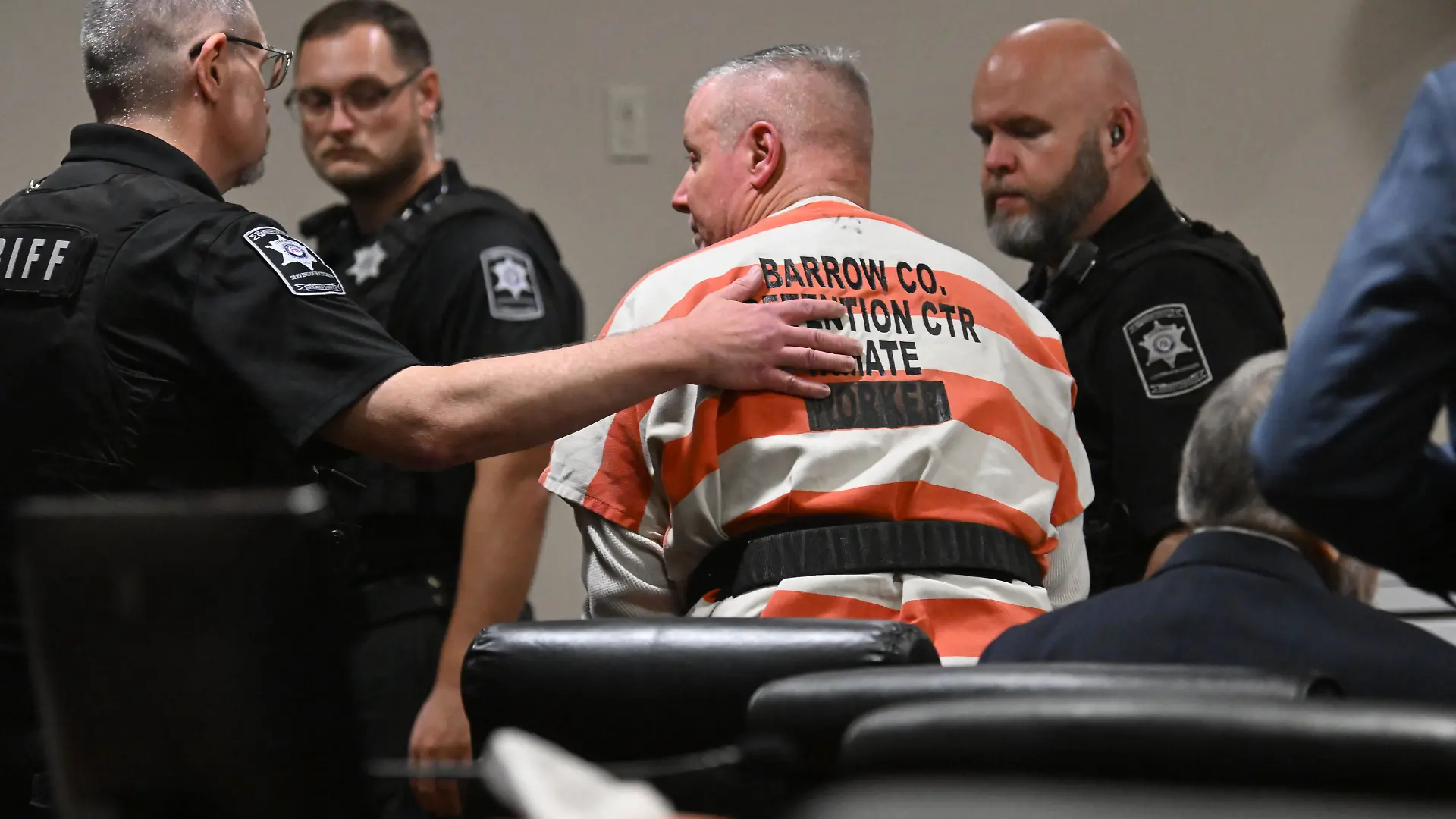 Colin Gray, father of the Apalachee High School shooter Colt Gray, is escorted to leave following his sentencing during his sentencing hearing at Barrow County Superior Court on Thursday, July 30, 2026, in Winder, Ga. (Hyosub Shin/Atlanta Journal-Constitution via AP, Pool)