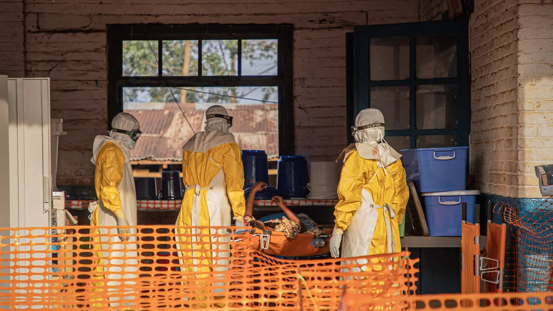 (260624) -- KINSHASA, June 24, 2026 (Xinhua) -- Medical workers escort an Ebola patient to an Ebola treatment center in Mongbwalu, Ituri Province, the Democratic Republic of the Congo, June 20, 2026. The Democratic Republic of the Congo (DRC) has reported 1,094 confirmed Ebola cases, including 277 deaths, in the current outbreak declared on May 15, with the World Health Organization (WHO) registering a record first-month caseload. Official data released Tuesday showed 387 cases were under quarantine or receiving treatment, and 115 recoveries. DRC authorities have also reported 131 suspected cases, including 44 suspected deaths. (Xinhua)