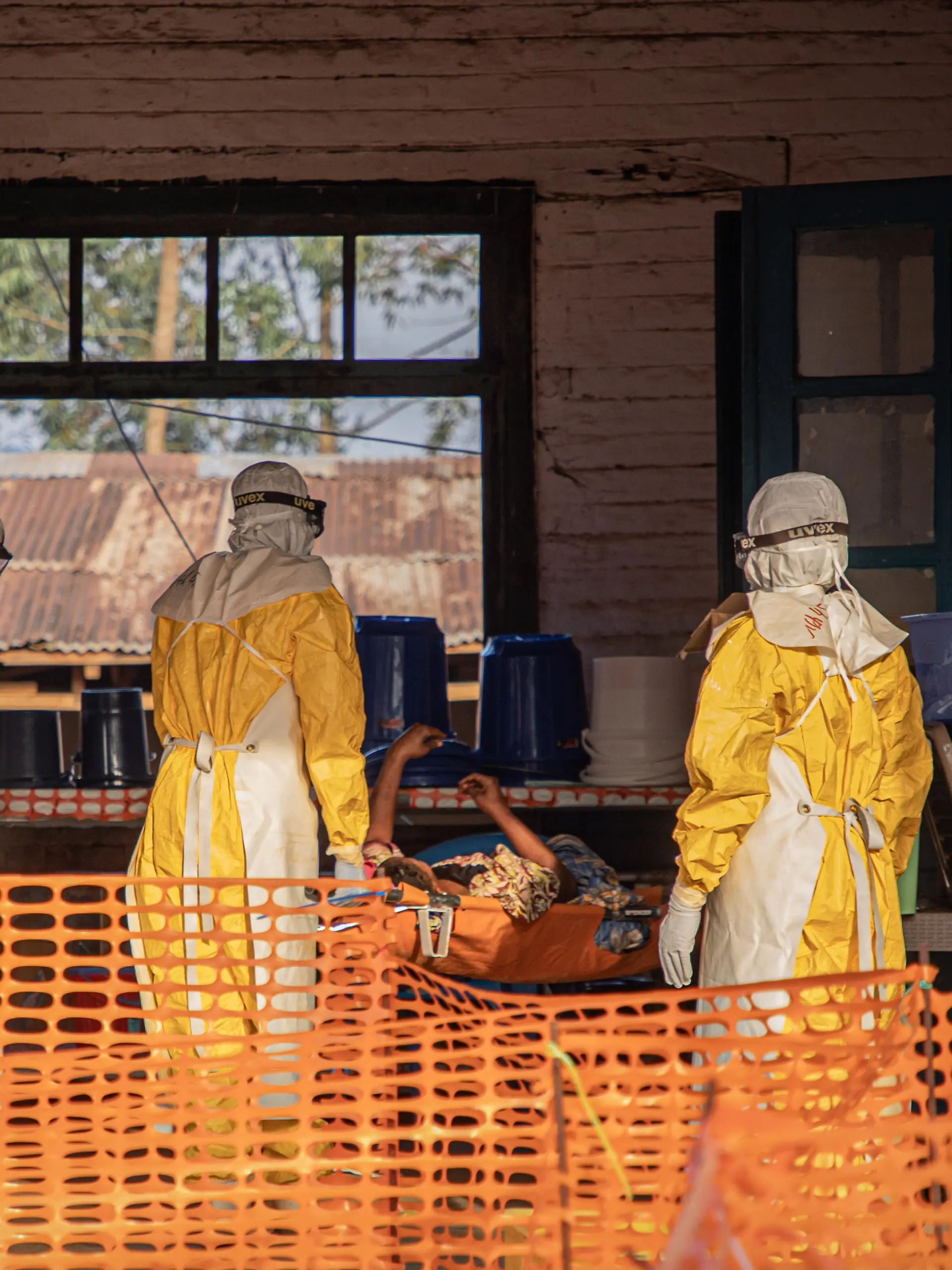 (260624) -- KINSHASA, June 24, 2026 (Xinhua) -- Medical workers escort an Ebola patient to an Ebola treatment center in Mongbwalu, Ituri Province, the Democratic Republic of the Congo, June 20, 2026. The Democratic Republic of the Congo (DRC) has reported 1,094 confirmed Ebola cases, including 277 deaths, in the current outbreak declared on May 15, with the World Health Organization (WHO) registering a record first-month caseload. Official data released Tuesday showed 387 cases were under quarantine or receiving treatment, and 115 recoveries. DRC authorities have also reported 131 suspected cases, including 44 suspected deaths. (Xinhua)
