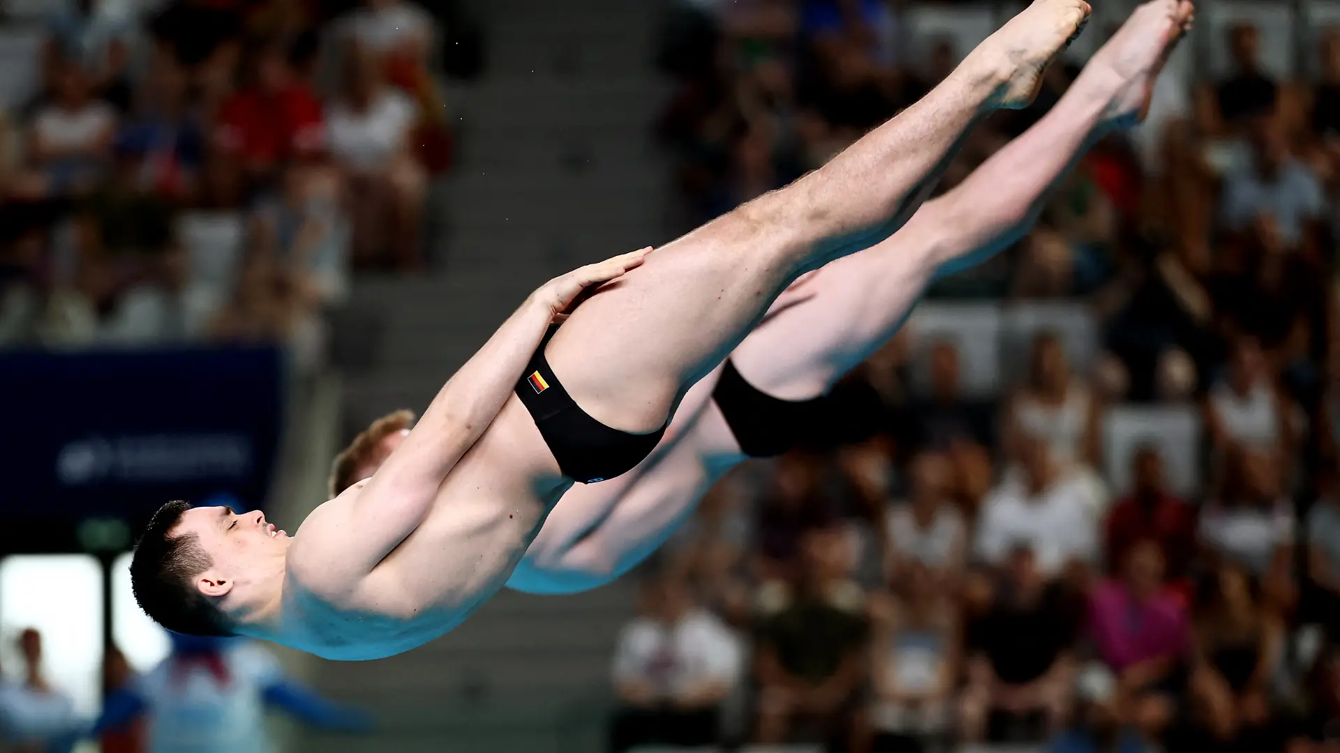 Diving - European Aquatics Championships - Paris Aquatic Centre, Paris, France - August 3, 2026 Germany's Lou Noel Guy Massenberg and Jonathan Gisbert Schauer in action during the Men's Synchronised 3m Springboard Final REUTERS/Gonzalo Fuentes