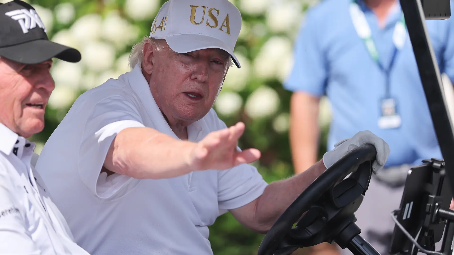 BEDMINSTER, NJ - AUGUST 09: President Donald Trump drives in a golf cart at Bedminster before the forth round of LIV Golf New York on August 9, 2026 at Trump National Golf Club in Bedminster, New Jersey. Photo by Andrew Mordzynski/Icon Sportswire GOLF: AUG 09 LIV Golf New York EDITORIAL USE ONLY Icon2608098162836