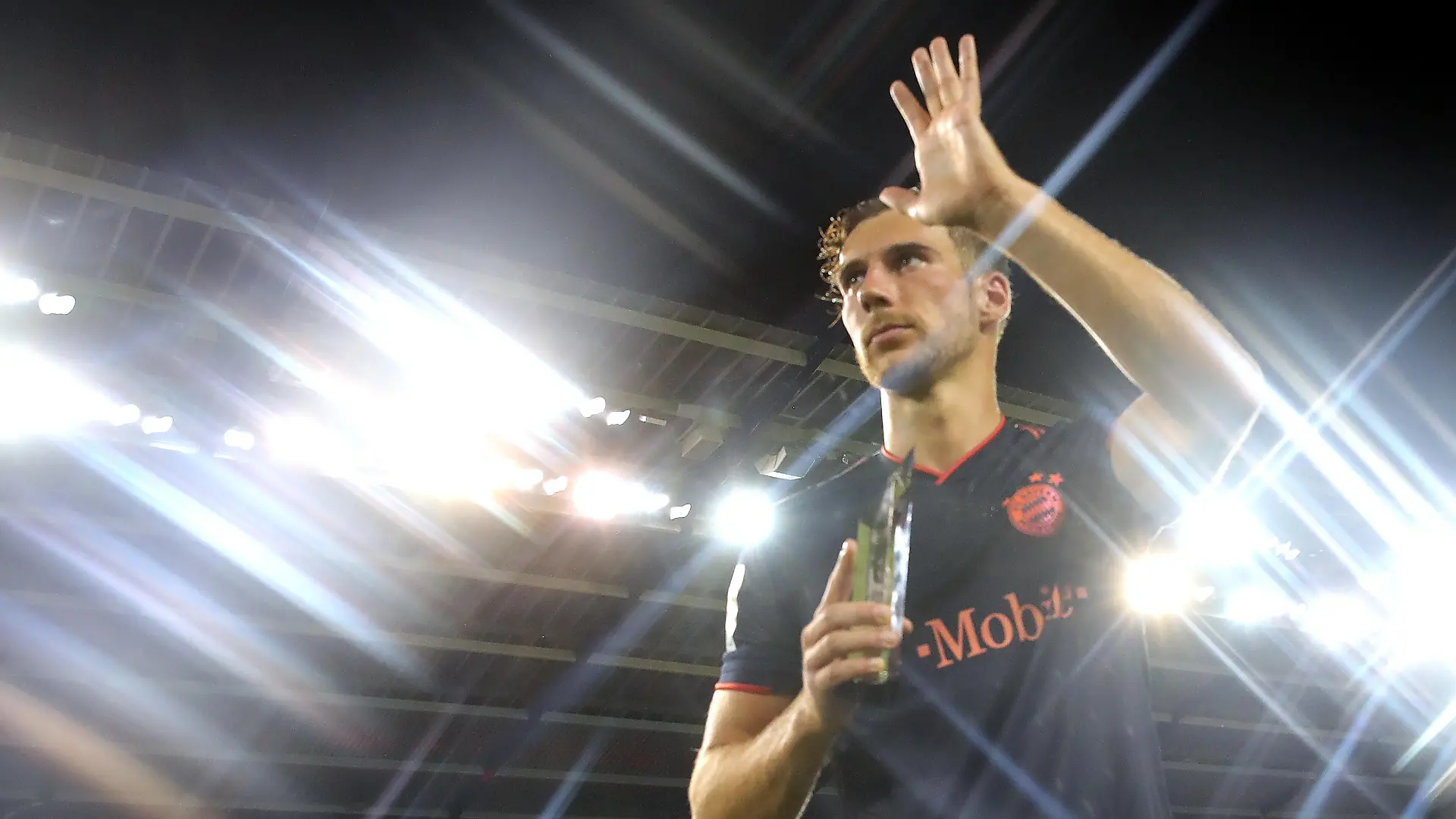 KANSAS CITY, MISSOURI - JULY 23: (EDITORS NOTE: A star effects camera filter was used for this image.)  Leon Goretzka of FC Bayern Muenchen is holds the Man of the Match award after the 2019 International Champions Cup match between FC Bayern and AC Milan at Children`s Mercy Park Stadium on July 23, 2019 in Kansas City, Missouri. (Photo by Alexander Hassenstein/Bongarts/Getty Images)
