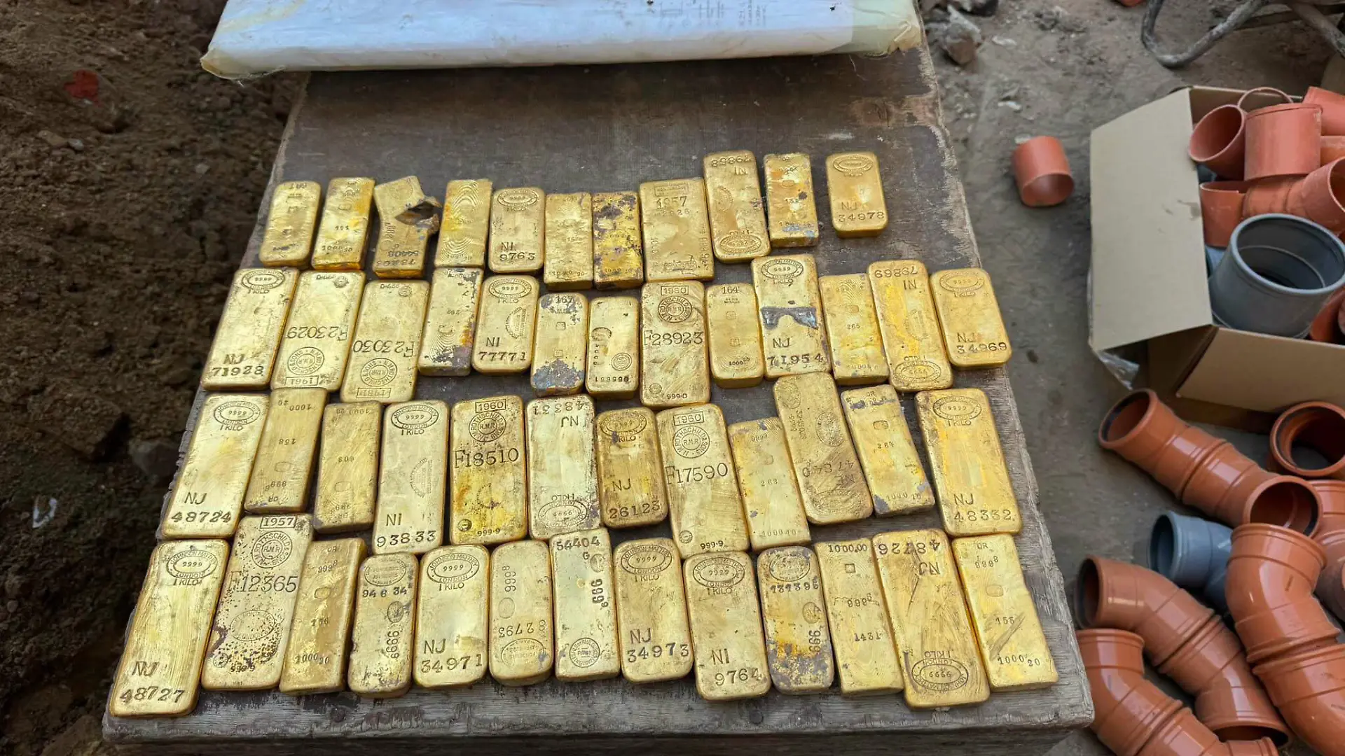 WORDS BYLINE: Hayley Chamberlain Builders renovating a property were stunned after discovering gold worth an estimated £7.6 MILLION hidden inside its walls. The haul of gold bars and coins was uncovered as workers drilled into the foundations of the building in Dendermonde, Belgium, while installing new sewage pipes. Among the crew was 18-year-old student Kobe, who was working a summer job. He initially thought the coins were ordinary 1 pieces before spotting what appeared to be a gold nugget. Kobe told Belgian broadcaster VRT: "Our first reaction was actually disbelief, amazement. "At first I thought they were 1 coins. But then we also saw a gold nugget lying there. "That's when we realised it was something bigger." The haul, reportedly worth around 9m (£7.6m), was handed to police. Site manager Mario said: "There are so many coins and bars - it would be almost impossible. "Besides, that would be theft." Kobe added: "9m you simply can't keep that hidden." The property in East Flanders is owned by welfare organisation CAW Oost-Vlaanderen. Director Geert Hillaert said his reaction was "surprise and amazement" and hopes the treasure could eventually help fund the charity's work and meet the "enormous need we experience daily". But exactly who will end up with the fortune could take years to establish. The local prosecutor has launched an investigation to discover where the gold came from and identify its rightful owner. Under Belgian law, an owner has five years to come forward and claim the treasure. If nobody does, hidden treasure found on someone else's property can be divided between the finder and the property owner - potentially leaving the builders and charity in line for a huge windfall. However, that would not apply if the gold is found to be linked to criminal activity. Police have warned would-be treasure hunters to stay away from the construction site, saying it has already been thoroughly searched and the gold moved to