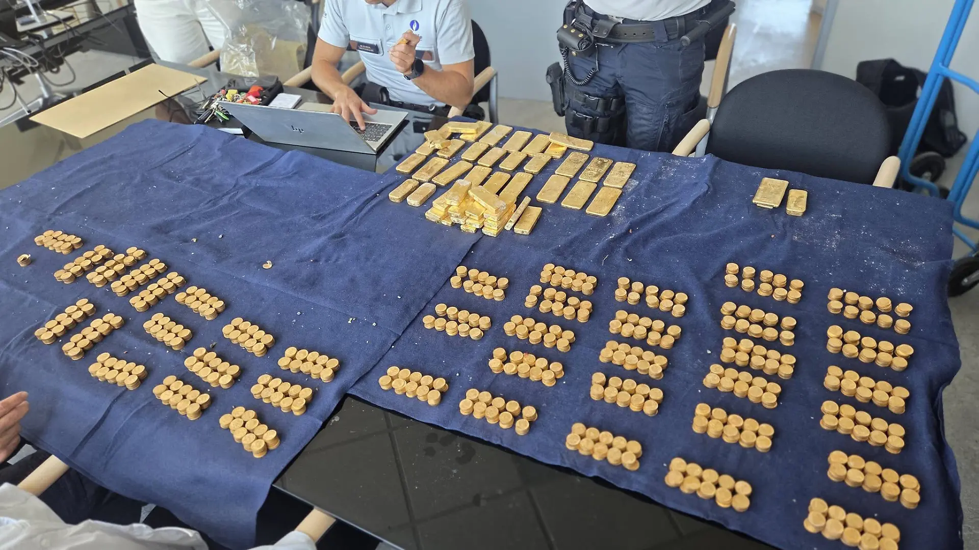 WORDS BYLINE: Hayley Chamberlain Builders renovating a property were stunned after discovering gold worth an estimated £7.6 MILLION hidden inside its walls. The haul of gold bars and coins was uncovered as workers drilled into the foundations of the building in Dendermonde, Belgium, while installing new sewage pipes. Among the crew was 18-year-old student Kobe, who was working a summer job. He initially thought the coins were ordinary 1 pieces before spotting what appeared to be a gold nugget. Kobe told Belgian broadcaster VRT: "Our first reaction was actually disbelief, amazement. "At first I thought they were 1 coins. But then we also saw a gold nugget lying there. "That's when we realised it was something bigger." The haul, reportedly worth around 9m (£7.6m), was handed to police. Site manager Mario said: "There are so many coins and bars - it would be almost impossible. "Besides, that would be theft." Kobe added: "9m you simply can't keep that hidden." The property in East Flanders is owned by welfare organisation CAW Oost-Vlaanderen. Director Geert Hillaert said his reaction was "surprise and amazement" and hopes the treasure could eventually help fund the charity's work and meet the "enormous need we experience daily". But exactly who will end up with the fortune could take years to establish. The local prosecutor has launched an investigation to discover where the gold came from and identify its rightful owner. Under Belgian law, an owner has five years to come forward and claim the treasure. If nobody does, hidden treasure found on someone else's property can be divided between the finder and the property owner - potentially leaving the builders and charity in line for a huge windfall. However, that would not apply if the gold is found to be linked to criminal activity. Police have warned would-be treasure hunters to stay away from the construction site, saying it has already been thoroughly searched and the gold moved to