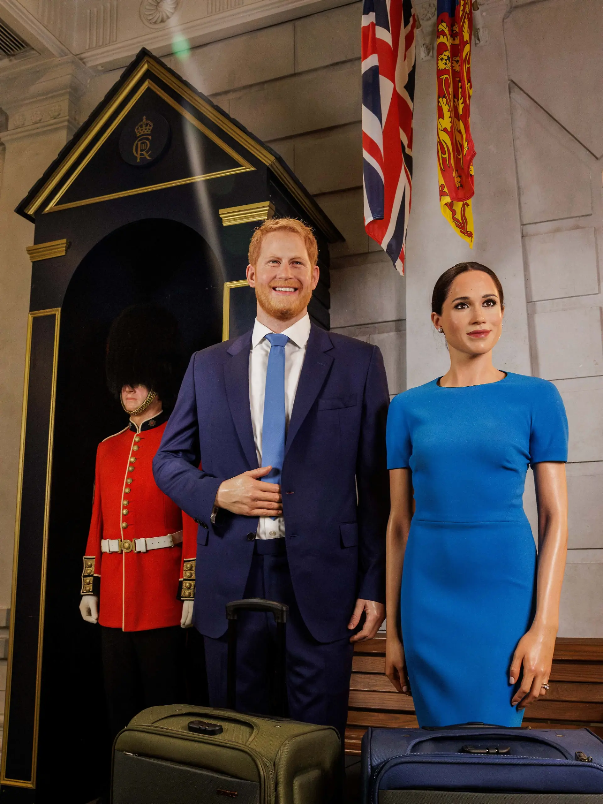 The waxworks of Britain's Prince Harry and his wife, Meghan, stand next to suitcases at the Madame Tussauds museum, in London, Britain, in this handout released August 20, 2026. Madame Tussauds London/Handout via REUTERS THIS IMAGE HAS BEEN SUPPLIED BY A THIRD PARTY. NO RESALES. NO ARCHIVES