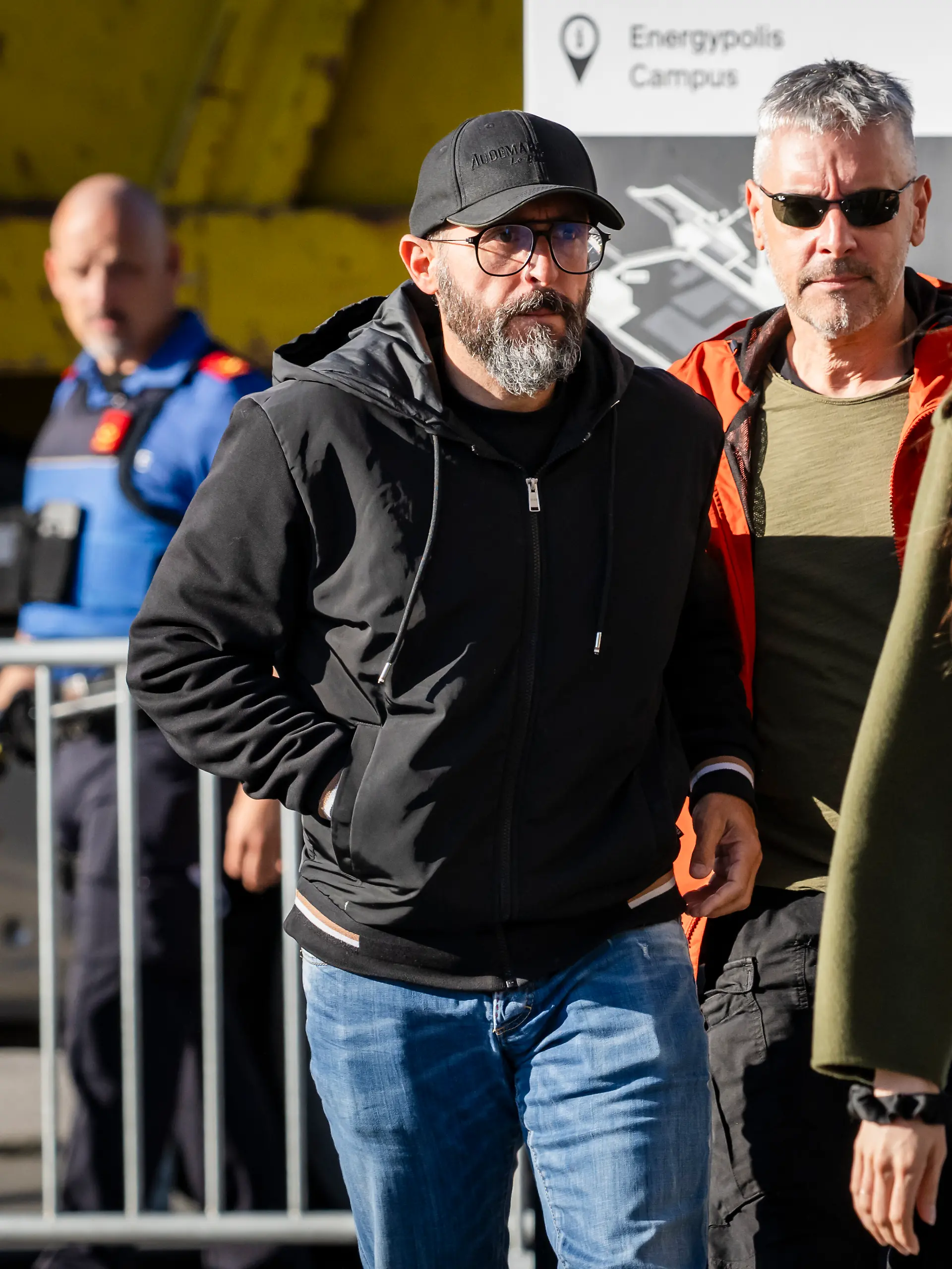 KEYPIX - Jacques and Jessica Moretti, owners of '"Le Constellation'", where 41 people died due to a fire during New Year celebrations, arrive surrounded by police officers for a hearing with the public prosecutor of the canton of Valais, in Sion, Switzerland, Friday, June 5, 2026. (KEYSTONE/Jean-Christophe Bott)