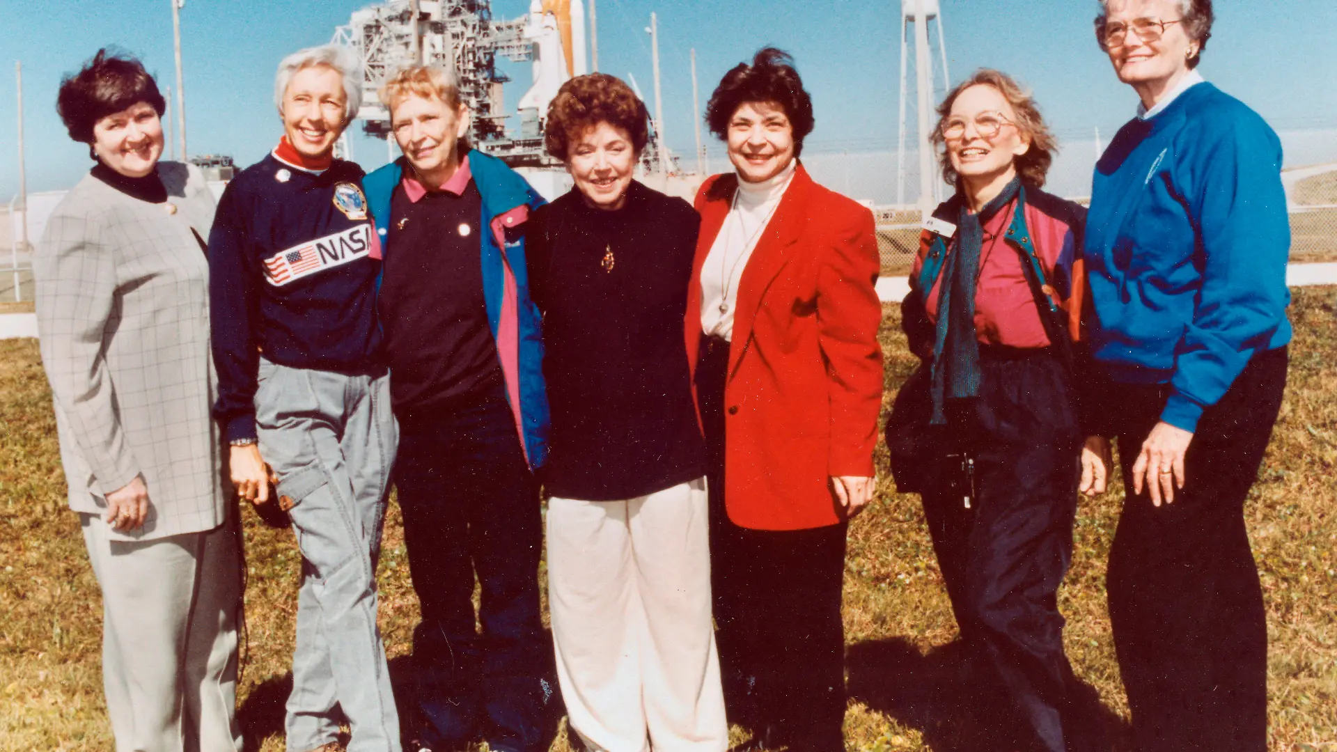 FILE - In this 1995 file photo, members of the FLATs, also known as the Mercury 13, gather for a photo as they attend a shuttle launch in Florida. From left are Gene Nora Jessen, Wally Funk, Jerrie Cobb, Jerri Truhill, Sarah Rutley, Myrtle Cagle and Bernice Steadman. Blue Origin's Jeff Bezos has chosen Funk, an early female aerospace pioneer, to rocket into space with him later this month. The company announced Thursday, July 1, 2021, that Funk will be aboard the July 20 launch from West Texas, flying as an “honored guest.” Funk, along with the other women of Mercury 13, went through astronaut training in the 1960s, but never made it to space - or even NASA's astronaut corps -  because of their gender.  (NASA via AP)