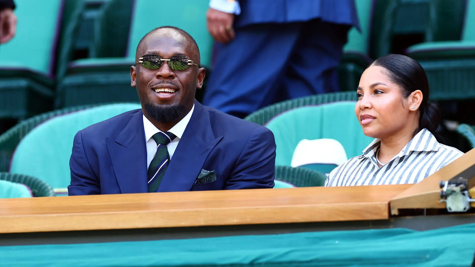 Usain Bolt and Kasi Bennett in the Royal Box on Centre Court Wimbledon Tennis Championships, Day 5, The All England Lawn Tennis and Croquet Club, London, UK - 03 Jul 2026London The All England Lawn Tennis and United Kingdom PUBLICATIONxINxGERxSUIxAUTxHUNxGRExMLTxCYPxROUxBULxUAExKSAxCHNxDENxINDxITAxPORxESPxSWExTURxMEXxCOLxVENxPERxECUxBRAxARGxCHIxURUxPARxPANxONLY Copyright: xJamesxMarsh/Shutterstockx 16970347av