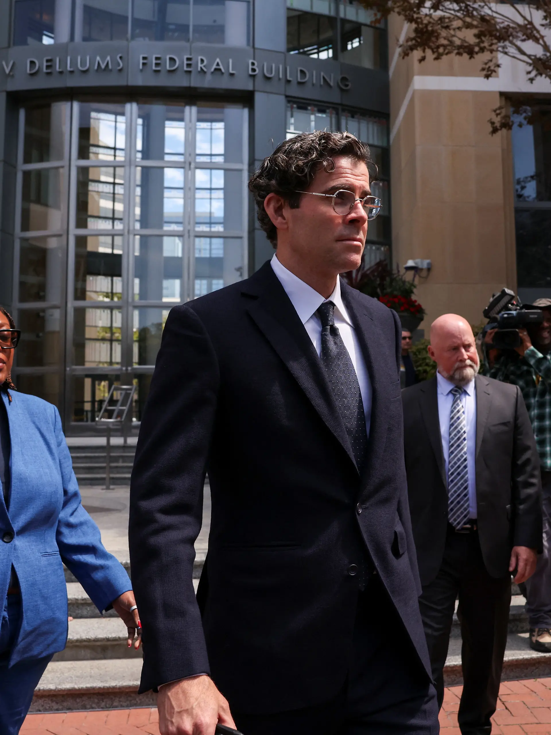 Witness Adam Mosseri, head of Instagram, leaves the courthouse, as Meta faces a landmark trial in federal court over claims from 29 states that the company illegally collected and used children's data in violation of federal law, allegedly designed its social media platforms to keep young users hooked and misled consumers about their safety, in Oakland, California, U.S., August 25, 2026. REUTERS/Manuel Orbegozo