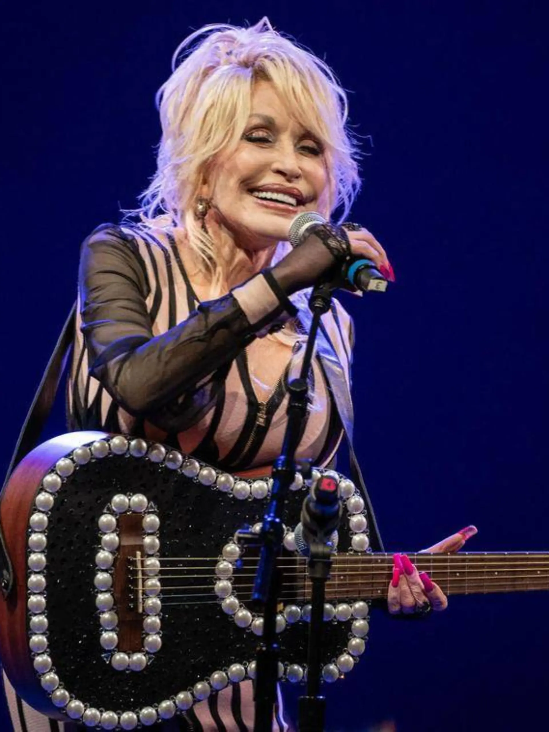US-NEWS-PARTON-OBIT-FILEPIC-3-KC Dolly Parton performed in Missouri and Kansas to celebrate statewide implementation of her program delivering free books to kids. Emily Curiel/The Kansas City Star/TNS EDITORIAL USE ONLY Copyright: xx 182997442W EmilyxCurielx krtphotoslive966276