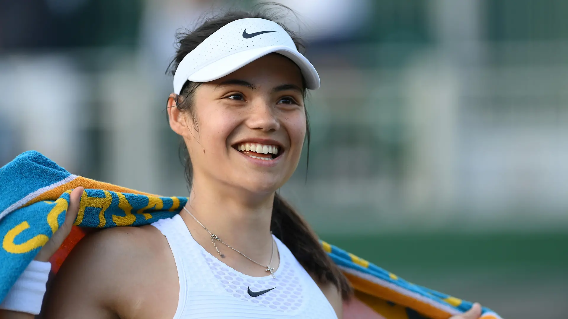 LONDON, ENGLAND - JULY 01: Emma Raducanu of United Kingdom smiles as she walks off court after her Ladies' Singles Second Round match against Marketa Vondrousova of Czech Republic during Day Four of The Championships - Wimbledon 2021 at All England Lawn Tennis and Croquet Club on July 01, 2021 in London, England. (Photo by Mike Hewitt/Getty Images)