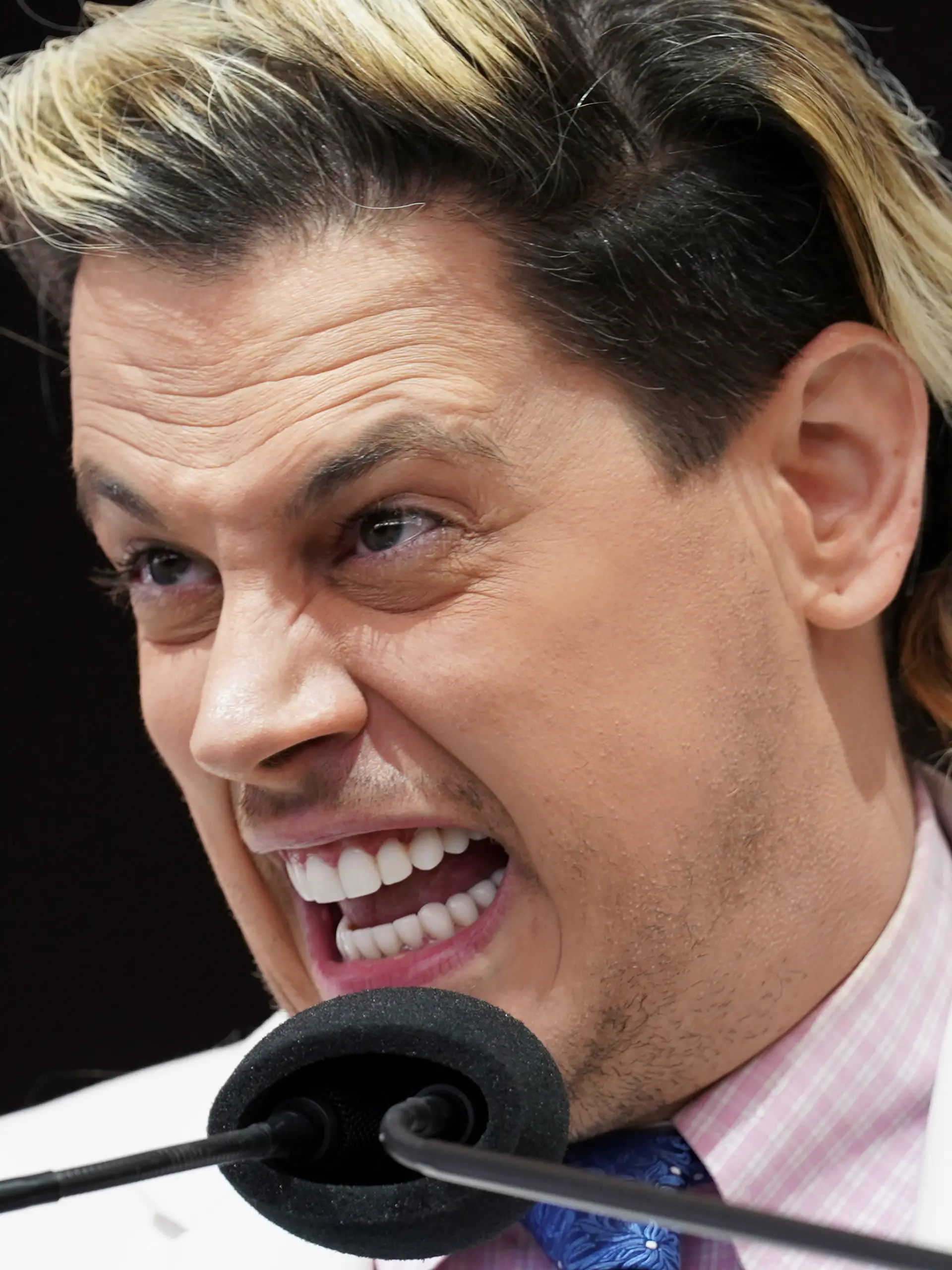 Far-right commentator Milo Yiannopoulos speaks during the "Bishops: Enough is Enough" rally taking place adjacent to the U.S. Conference of Catholic Bishops (USCCB) annual General Assembly meeting in Baltimore, Maryland, U.S., November 16, 2021. REUTERS/Kevin Lamarque