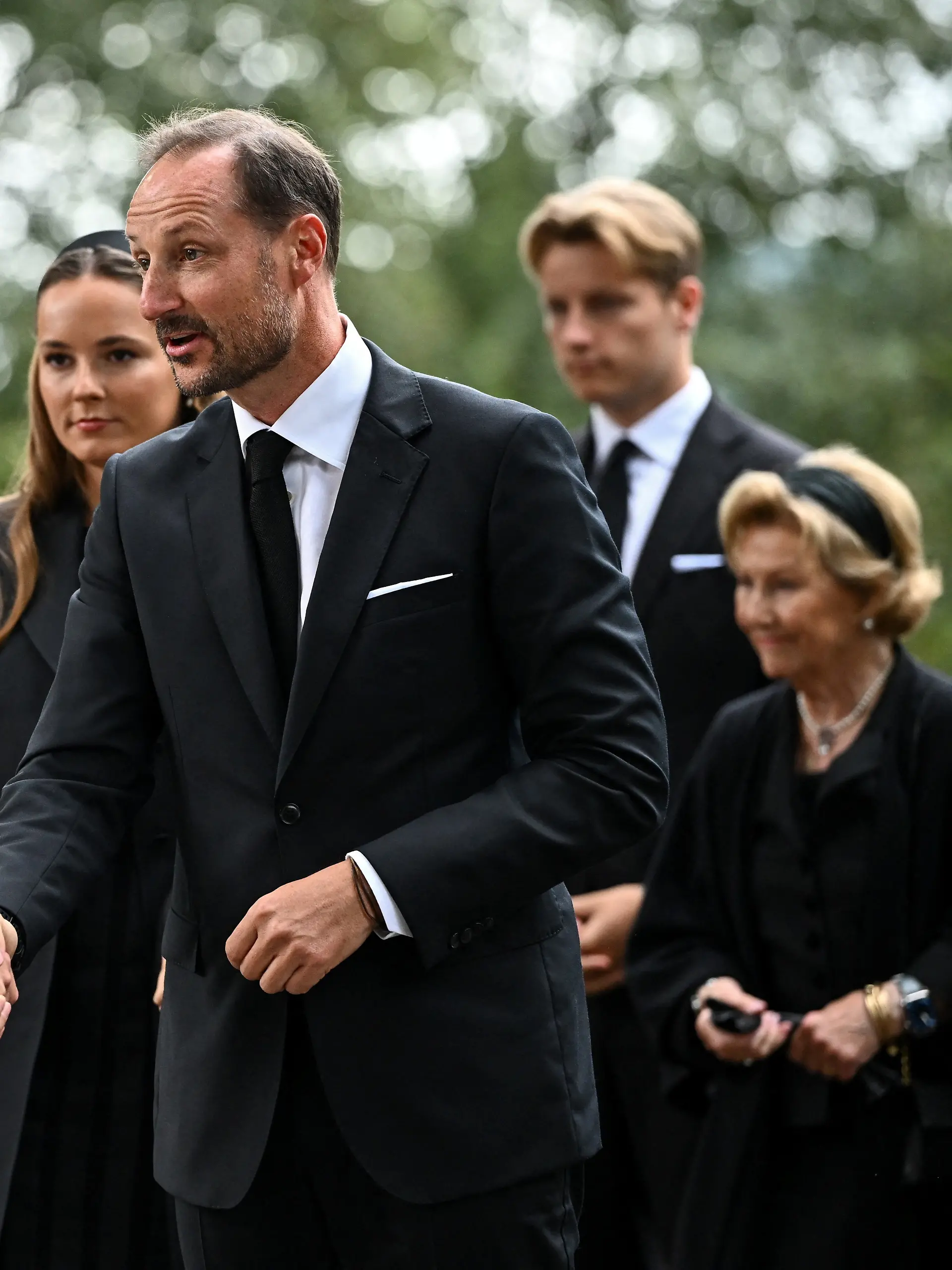 Norway’s King Haakon, the wife of late King Harald, Queen Sonja, Crown Princess Ingrid Alexandra and Prince Sverre Magnus arrive at Asker church to attend a memorial service for the late King Harald, in Asker, Norway, August 30, 2026.