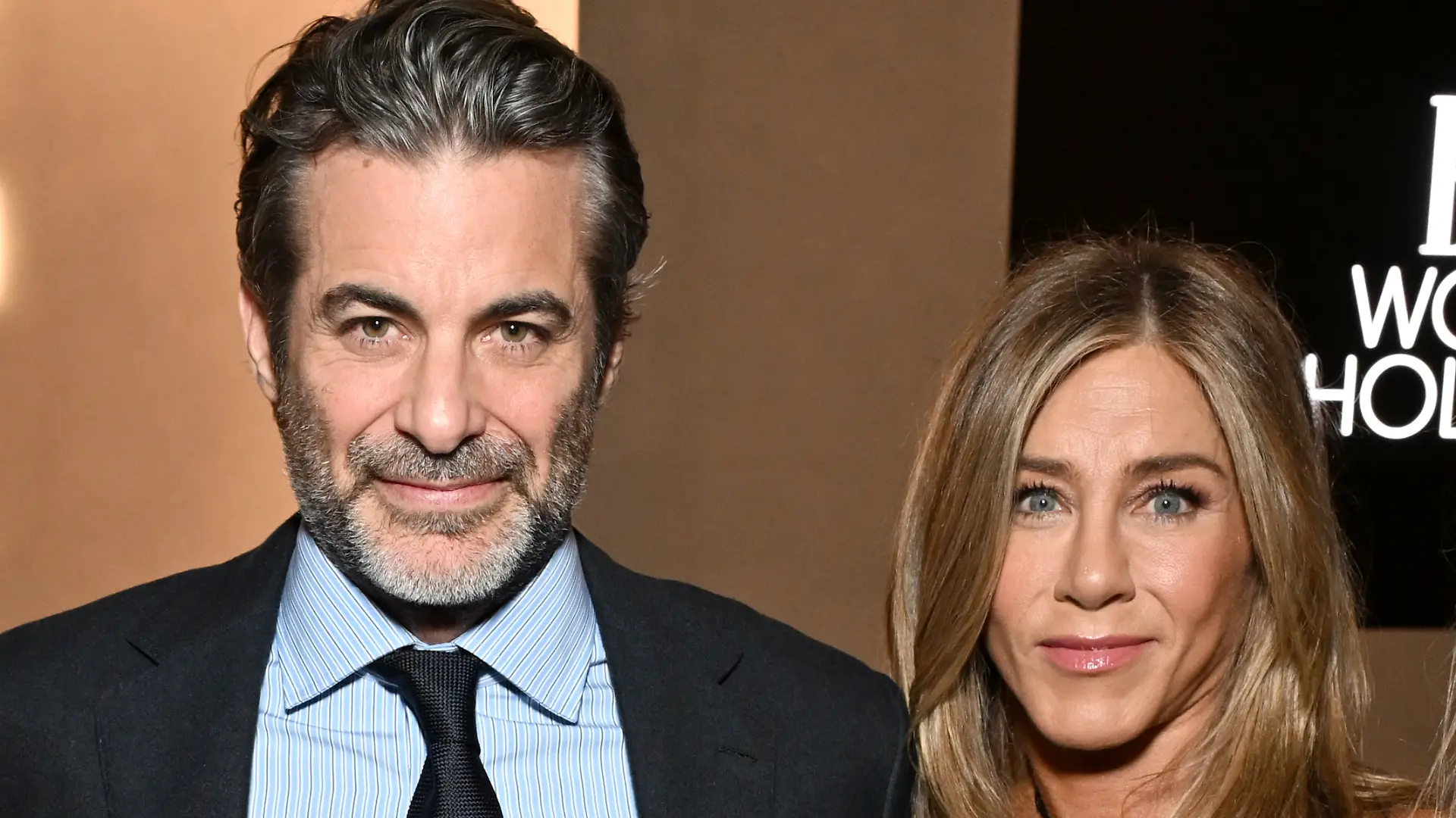 LOS ANGELES, CALIFORNIA - NOVEMBER 17: (L-R) Jim Curtis and Jennifer Aniston, wearing Ralph Lauren, attend ELLE's 2025 Women in Hollywood Celebration presented by Ralph Lauren and Bvlgari with support from evian, Hendrick's Gin, and Lucid Motors on November 17, 2025 in Los Angeles, California. (Photo by Michael Kovac/Getty Images for ELLE)