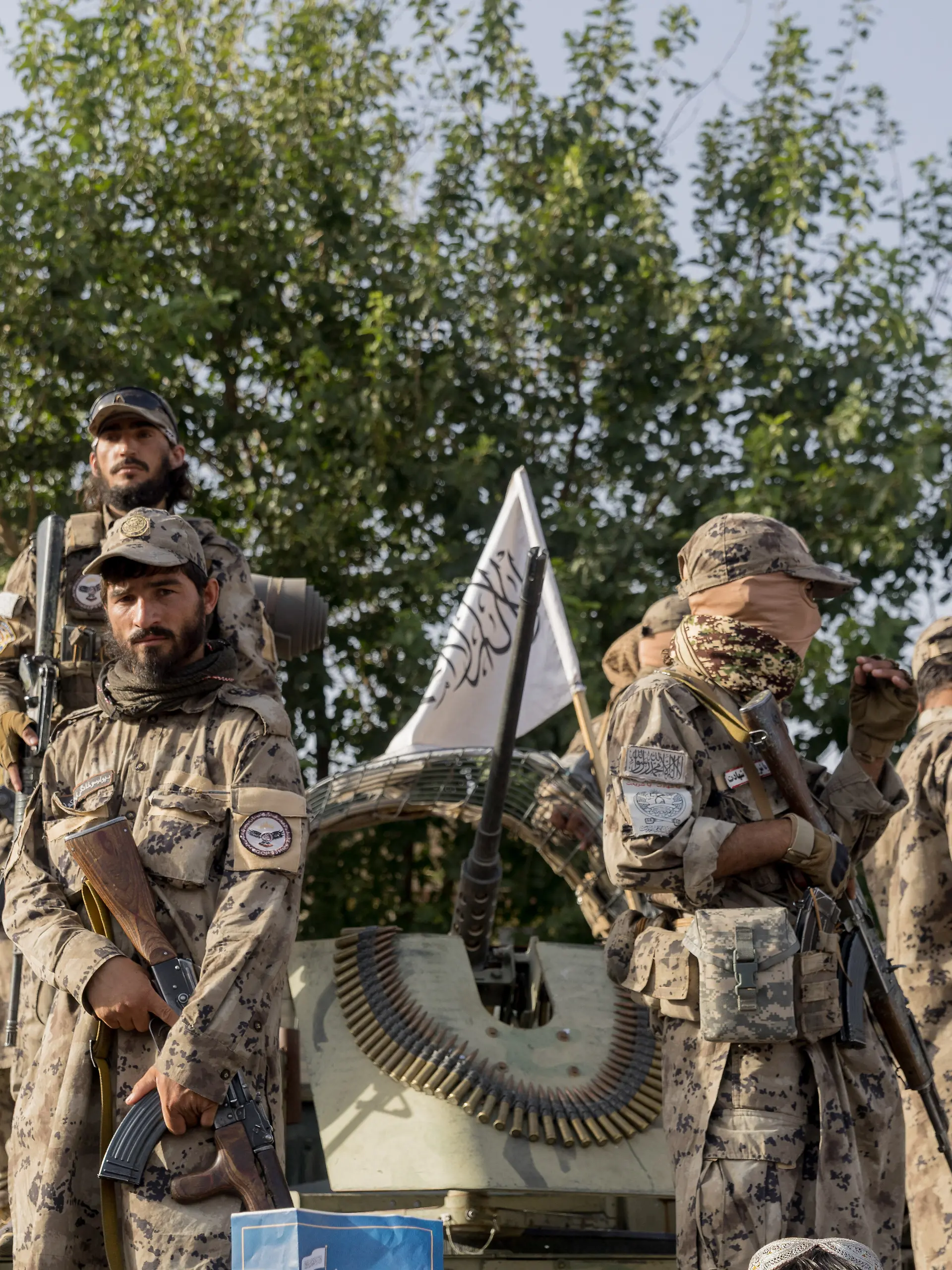 Armed Taliban fighters stand on a military vehicle during celebrations for the fifth anniversary of the Taliban's takeover in Herat, Afghanistan, on August 15, 2026. The nationwide holiday marks the collapse of the previous government and the withdrawal of international forces in 2021.//MIDDLEEASTIMAGES_MEI-AFG-MANI-TFACHJ-20260815-0028/Credit:Mustafa Noori/MEI/SIPA/2608160935