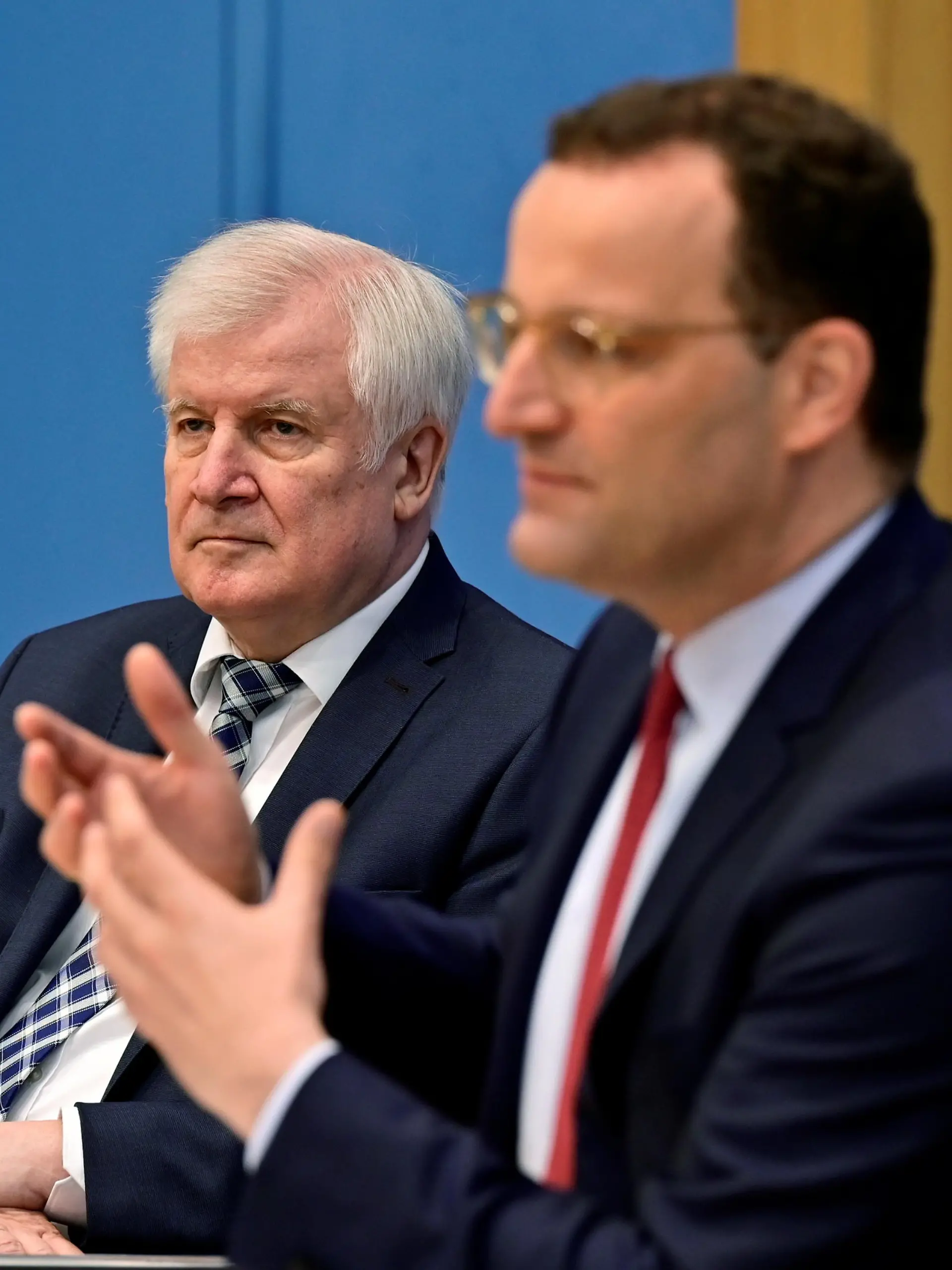 German Health Minister Jens Spahn (R) and German Interior Minister Horst Seehofer speak during a joint news conference on the COVID-19 situation and entry regulation on Germany's territory, in Berlin July 1, 2021. John Macdougall/Pool via REUTERS