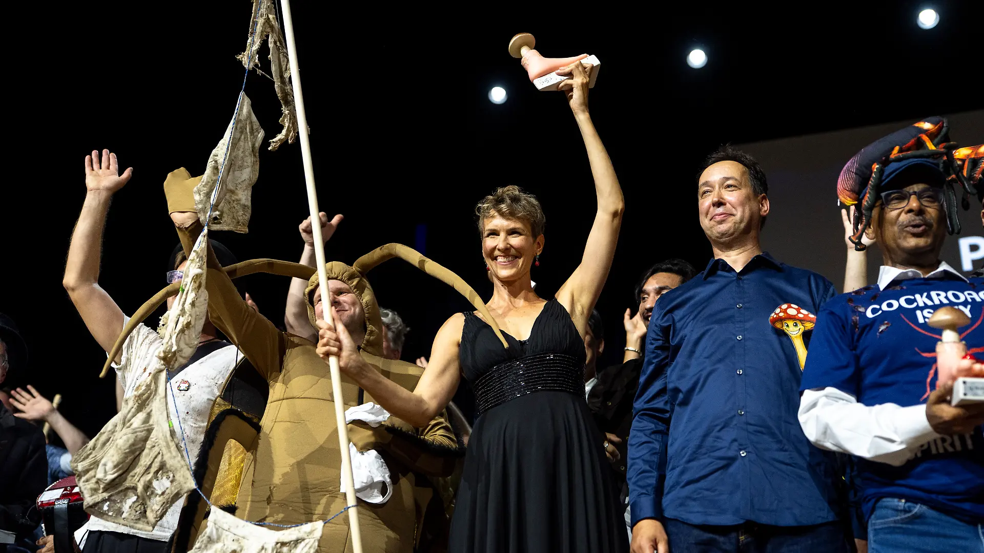 (L to R) Atlant Bieri, Pia Viviani and Marcel van der Heijden pose with the trophy during the 36th First Annual Ig Nobel Prize ceremony held in the Zurich Convention Center in Zurich, Switzerland on Thursday, 3. September 2026. (KEYSTONE/Claudio Thoma)