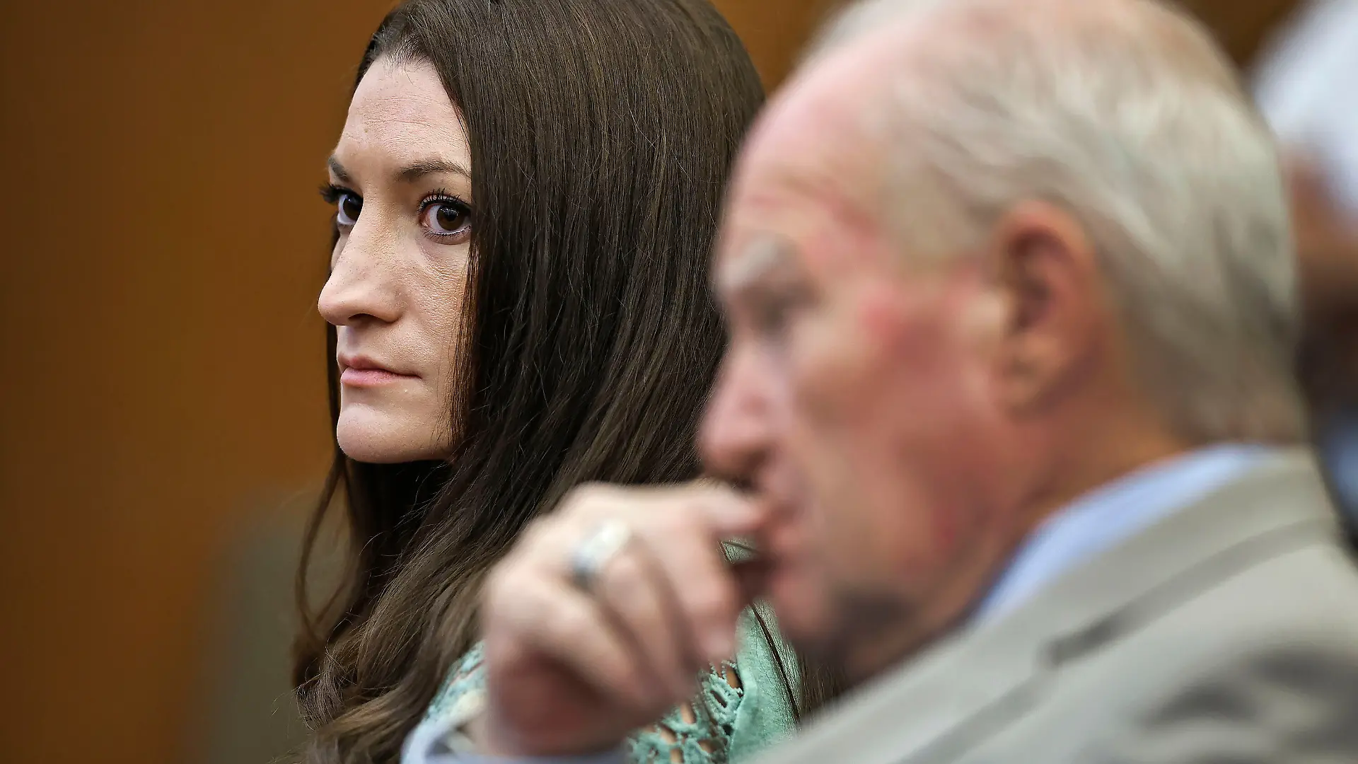 Lindsay Clancy watches jurors enter the courtroom for their second day of deliberations as defense attorney Kevin Reddington sits to her right at Plymouth Superior Court in Plymouth, Mass., Friday, Aug. 28, 2026. (Greg Derr/The Patriot Ledger via AP, Pool)