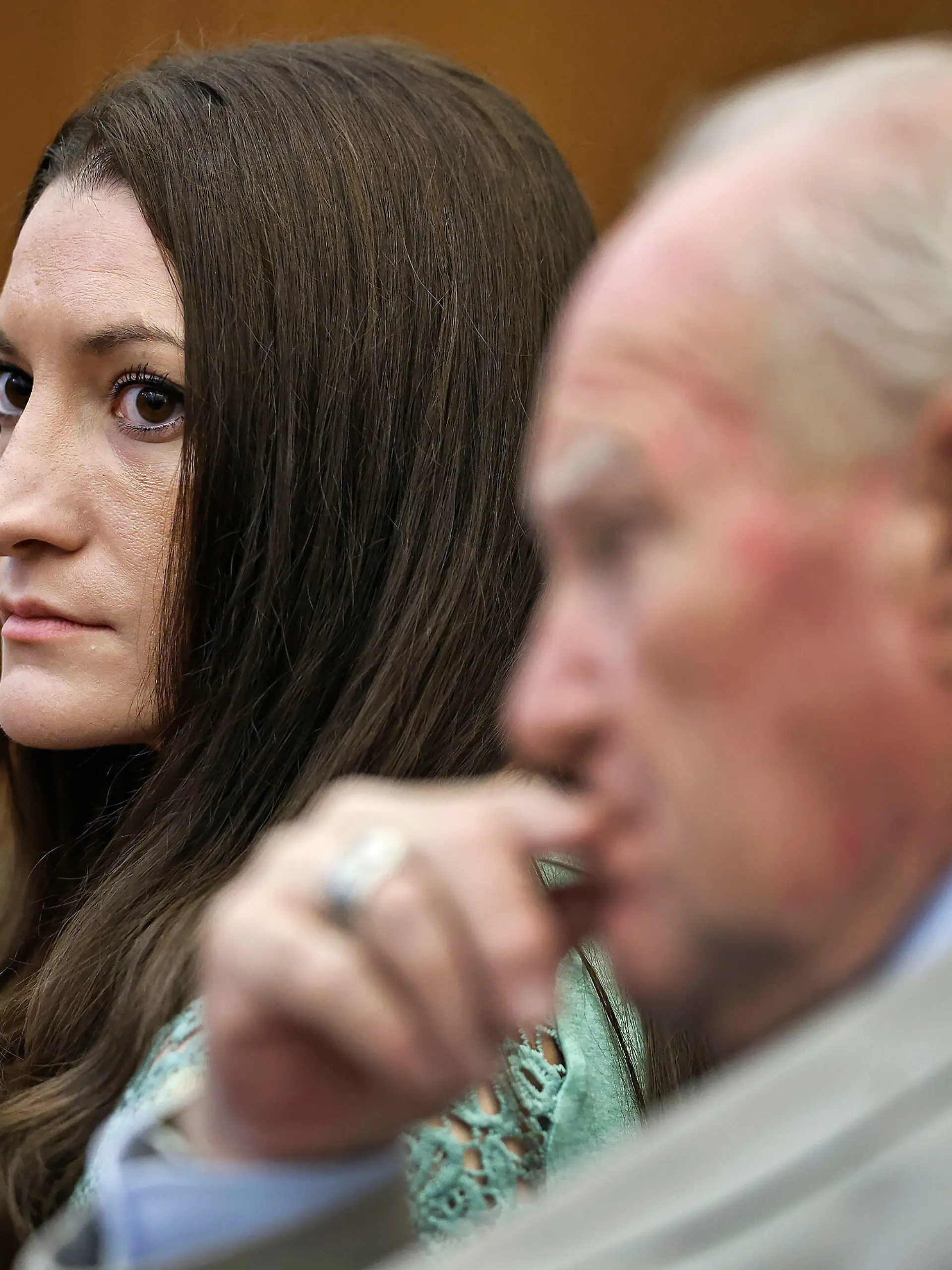 Lindsay Clancy watches jurors enter the courtroom for their second day of deliberations as defense attorney Kevin Reddington sits to her right at Plymouth Superior Court in Plymouth, Mass., Friday, Aug. 28, 2026. (Greg Derr/The Patriot Ledger via AP, Pool)