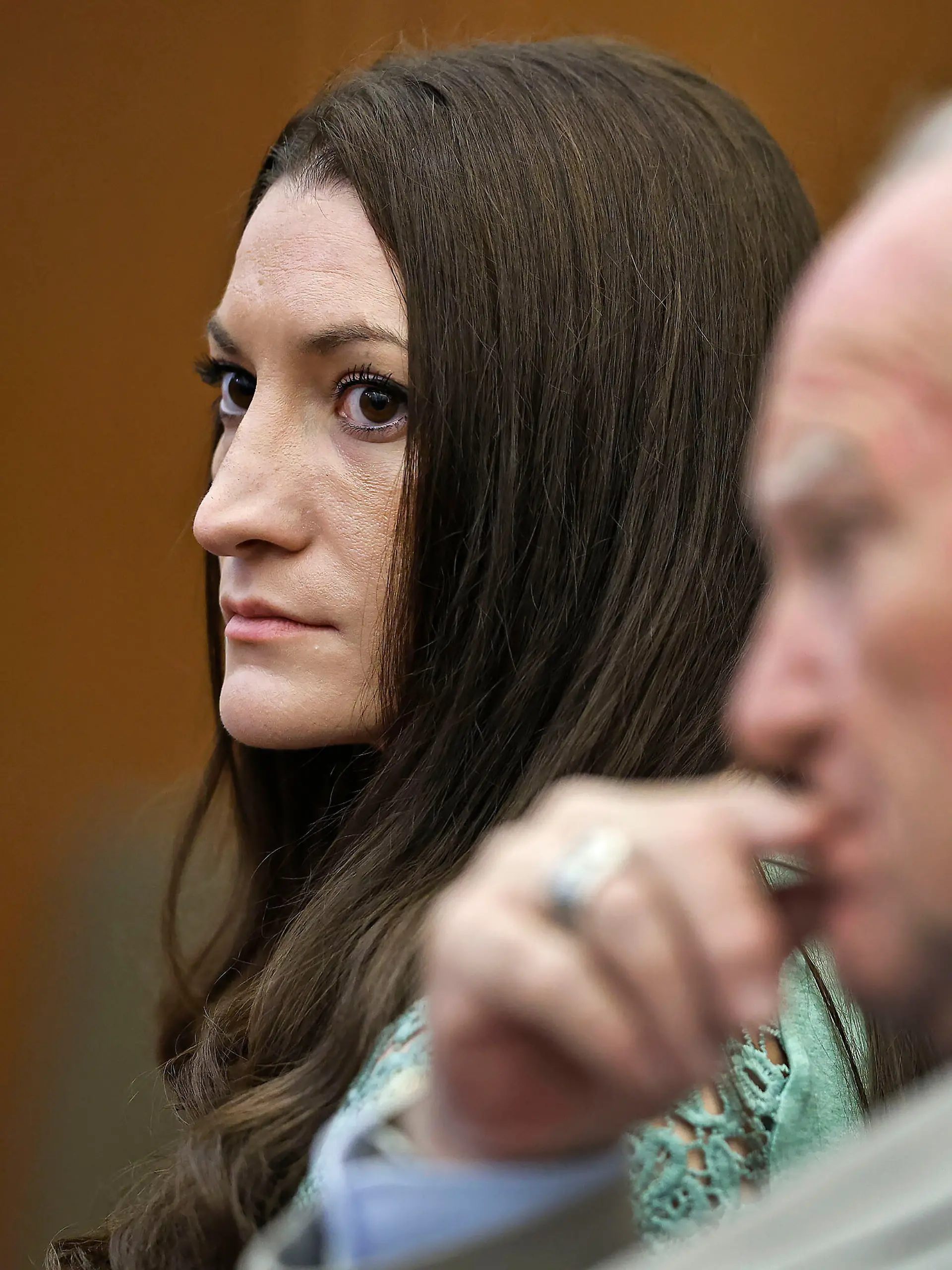 Lindsay Clancy watches jurors enter the courtroom for their second day of deliberations as defense attorney Kevin Reddington sits to her right at Plymouth Superior Court in Plymouth, Mass., Friday, Aug. 28, 2026. (Greg Derr/The Patriot Ledger via AP, Pool)