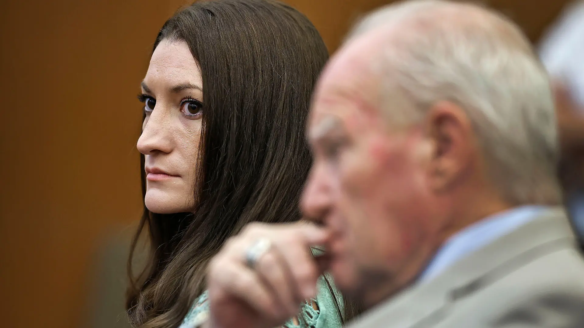 Lindsay Clancy watches jurors enter the courtroom for their second day of deliberations as defense attorney Kevin Reddington sits to her right at Plymouth Superior Court in Plymouth, Mass., Friday, Aug. 28, 2026. (Greg Derr/The Patriot Ledger via AP, Pool)