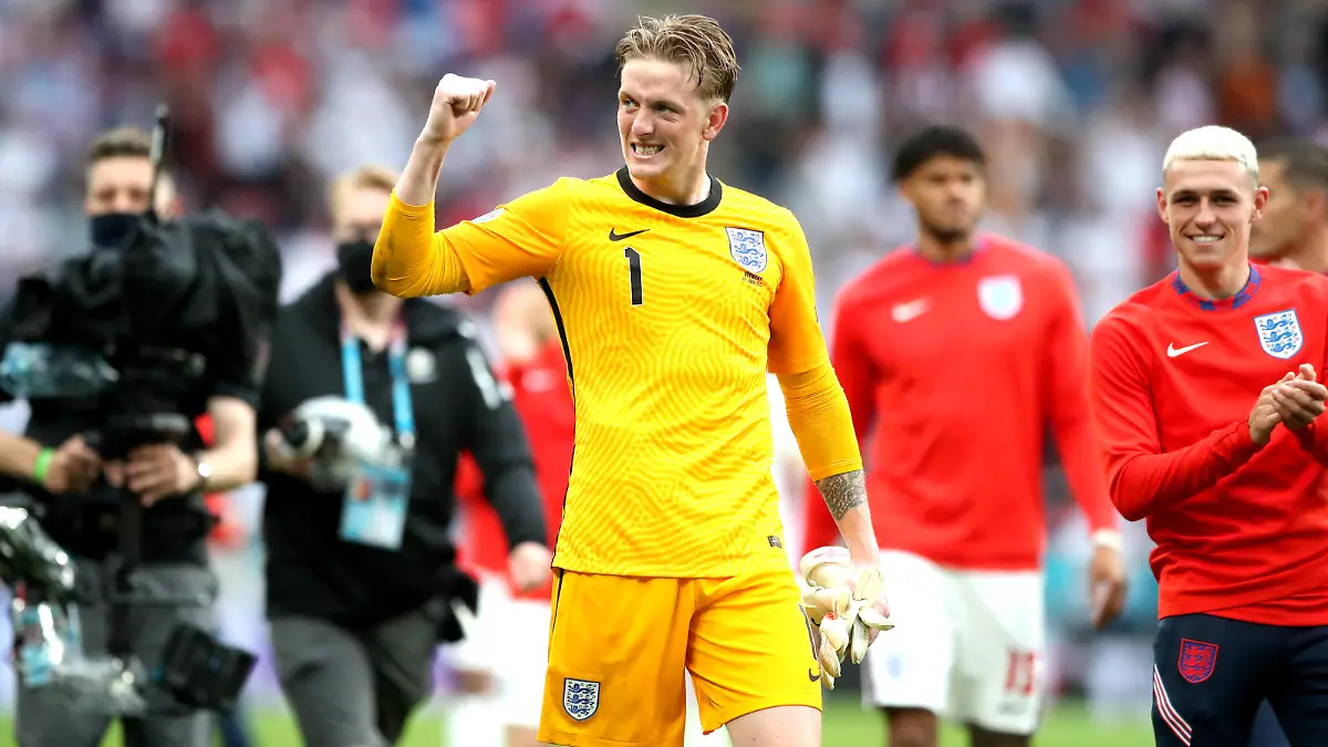 England v Germany - UEFA EURO, EM, Europameisterschaft,Fussball 2020 - Round of 16 - Wembley Stadium England goalkeeper Jordan Pickford celebrates after the UEFA Euro 2020 round of 16 match at Wembley Stadium, London. Picture date: Tuesday June 29, 2021. Use subject to restrictions. Editorial use only, no commercial use without prior consent from rights holder. PUBLICATIONxINxGERxSUIxAUTxONLY Copyright: xNickxPottsx 60650024