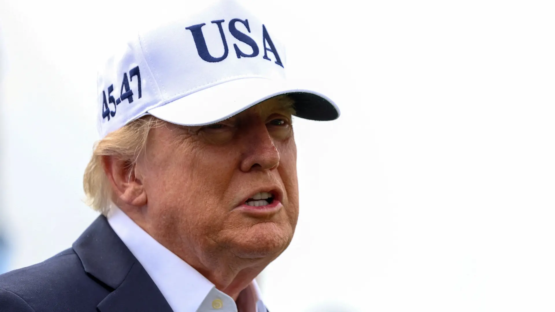 U.S. President Donald Trump looks on during the Amgen Irish Open 2026, at Trump International Golf Links in Doonbeg, County Clare, Ireland, September 13, 2026. REUTERS/Cathal McNaughton