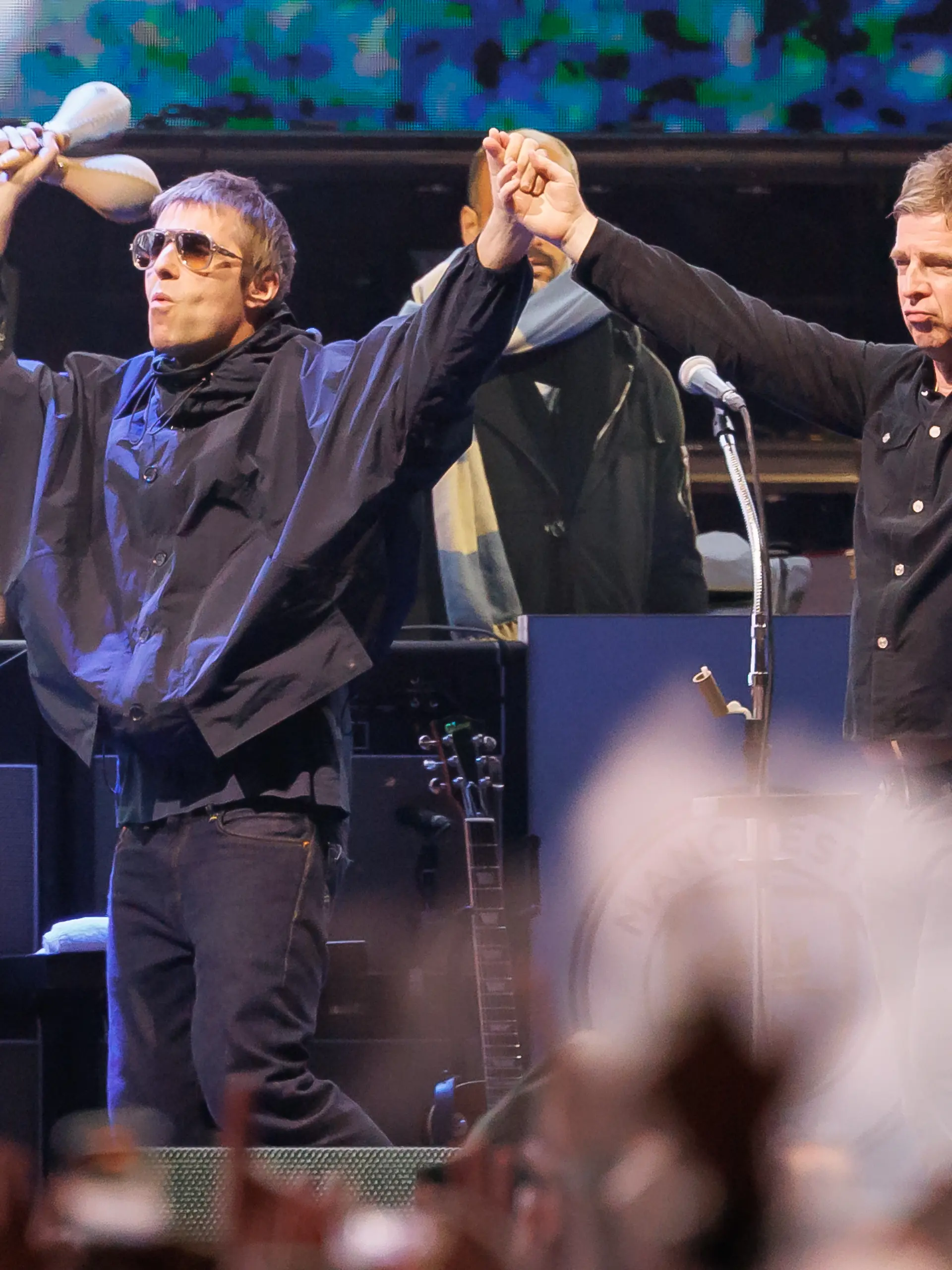 Liam Gallagher, Noel Gallagher of Oasis perform onstage at the Oasis Live '25 World Tour held at the Rose Bowl on September 07, 2025 in Pasadena, California. (Photo by Rich Polk/Variety via Getty Images)