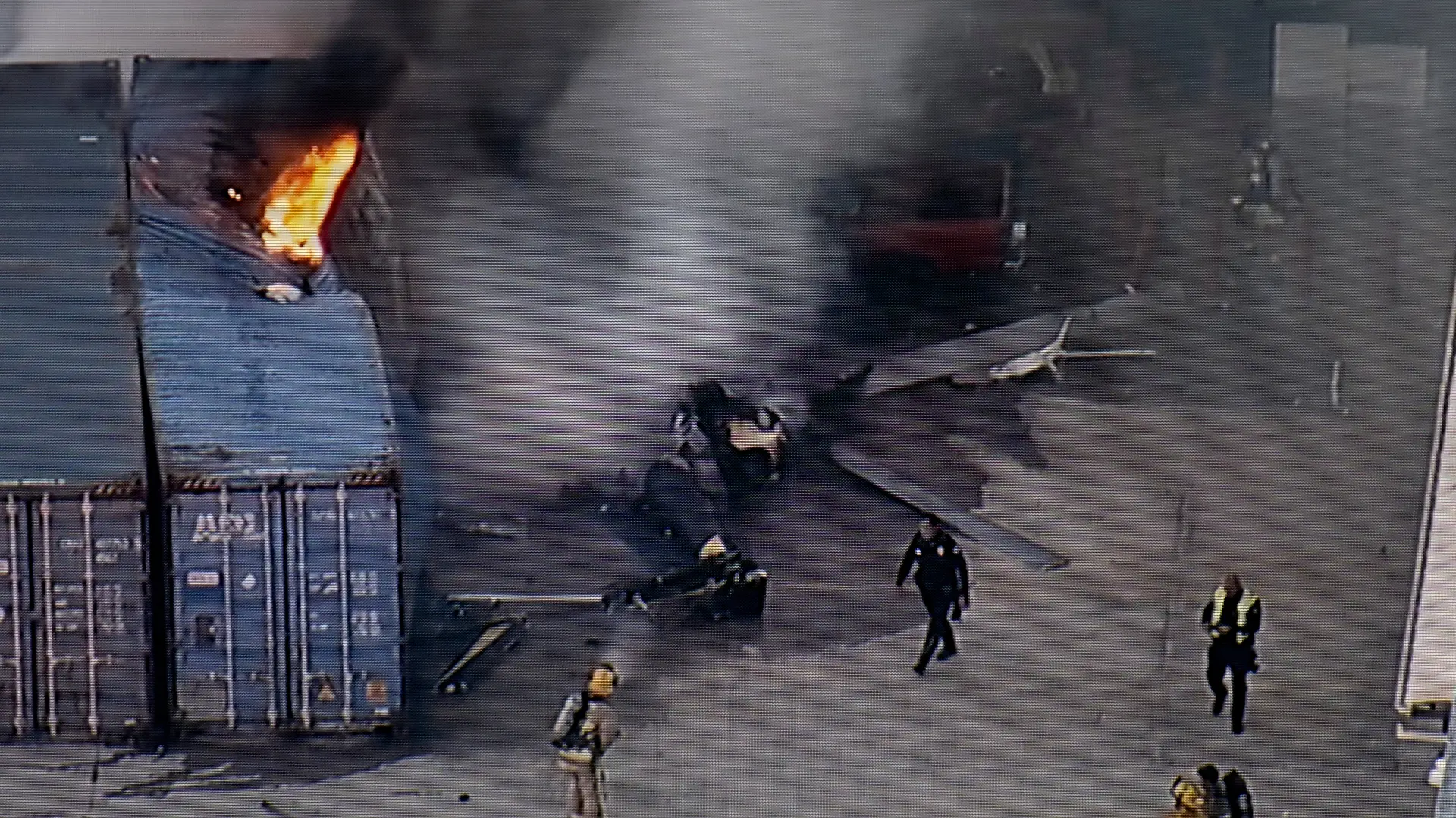 In this still image provided by KABC-TV shows first responders work the scene after a helicopter crashed near a bus crash in Chatsworth, a neighborhood in Los Angeles, Tuesday, Sept. 15, 2026. (KABC-TV via AP)