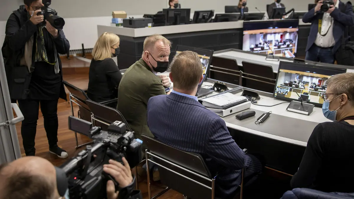 The trial of a Danish man (blue suit) who is suspected of murder and attempted murder of a German couple aboard the Viking Sally ferry in the summer of 1987 started at the Southwest district court in Turku, Finland, May 24, 2021. The court acquitted the defendant on June 30, 2021. According to the verdict the allegations did not provide sufficient evidence. Twenty-year-old Klaus Schelkle died in the attack while his 22-year-old girlfriend, Bettina Taxis, sustained serious injuries. Danish boy scouts were the first to discover the victims. Prosecutors have filed homicide charges against the Danish man born in 1969. The defendant has denied the charges. Lehtikuva/Roni Lehti via REUTERS      THIS IMAGE HAS BEEN SUPPLIED BY A THIRD PARTY. FINLAND OUT. NO COMMERCIAL OR EDITORIAL SALES IN FINLAND. NO THIRD PARTY SALES. NOT FOR USE BY REUTERS THIRD PARTY DISTRIBUTORS. EDITORS NOTE: Finnish News Agency STT does not publish the name or picture of the accused