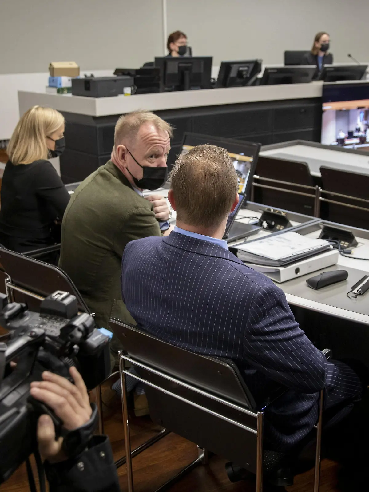 The trial of a Danish man (blue suit) who is suspected of murder and attempted murder of a German couple aboard the Viking Sally ferry in the summer of 1987 started at the Southwest district court in Turku, Finland, May 24, 2021. The court acquitted the defendant on June 30, 2021. According to the verdict the allegations did not provide sufficient evidence. Twenty-year-old Klaus Schelkle died in the attack while his 22-year-old girlfriend, Bettina Taxis, sustained serious injuries. Danish boy scouts were the first to discover the victims. Prosecutors have filed homicide charges against the Danish man born in 1969. The defendant has denied the charges. Lehtikuva/Roni Lehti via REUTERS      THIS IMAGE HAS BEEN SUPPLIED BY A THIRD PARTY. FINLAND OUT. NO COMMERCIAL OR EDITORIAL SALES IN FINLAND. NO THIRD PARTY SALES. NOT FOR USE BY REUTERS THIRD PARTY DISTRIBUTORS. EDITORS NOTE: Finnish News Agency STT does not publish the name or picture of the accused