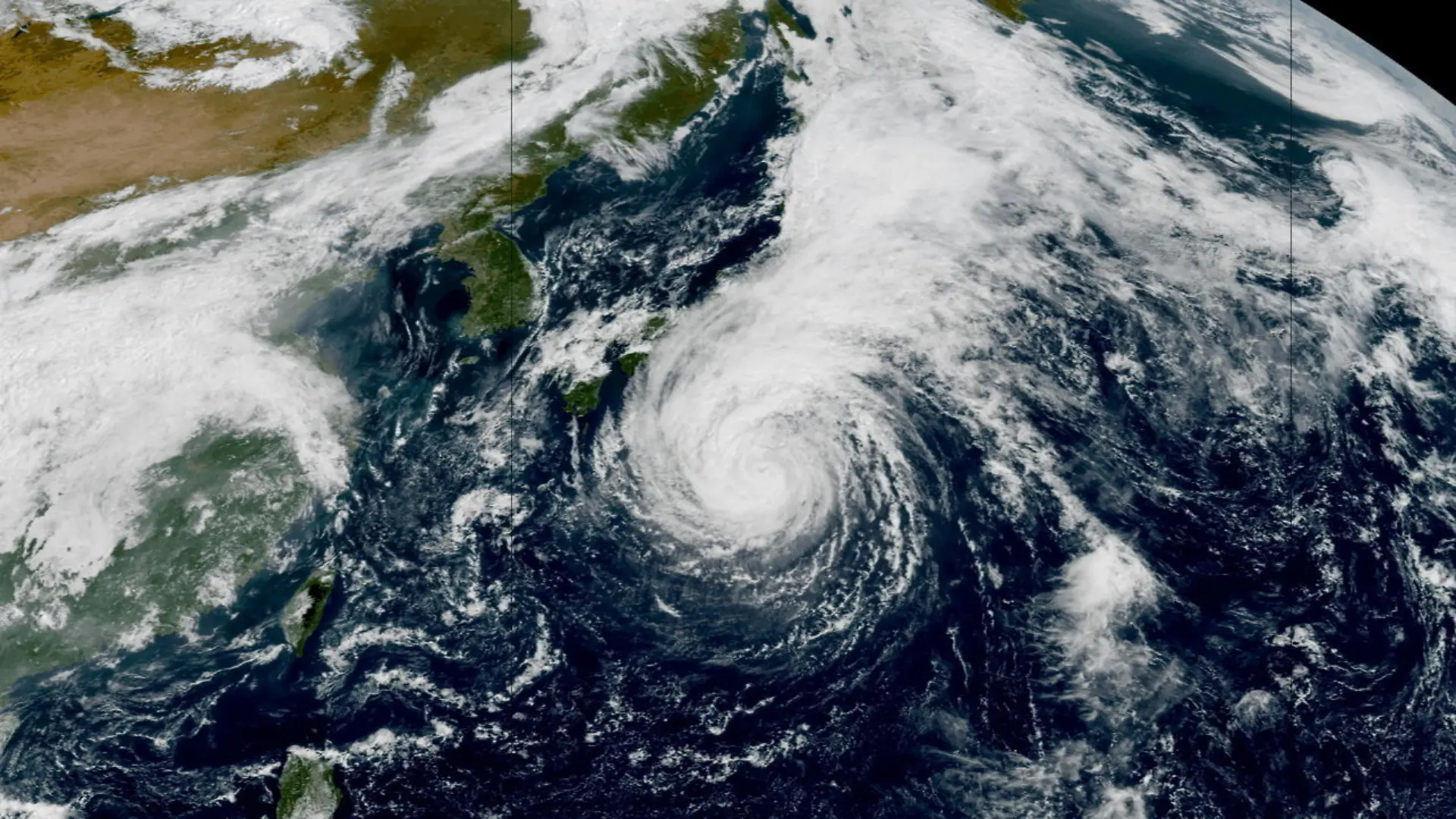 A satellite view shows a typhoon Dujuan approaching Japan, September 20, 2026, in this screengrab obtainted from a timelapse satellite file. CSU/CIRA AND KMA/NMSC/Handout via REUTERS THIS IMAGE HAS BEEN SUPPLIED BY A THIRD PARTY. MANDATORY CREDIT. OVERLAY FROM SOURCE. DO NOT OBSCURE LOGO. TPX IMAGES OF THE DAY