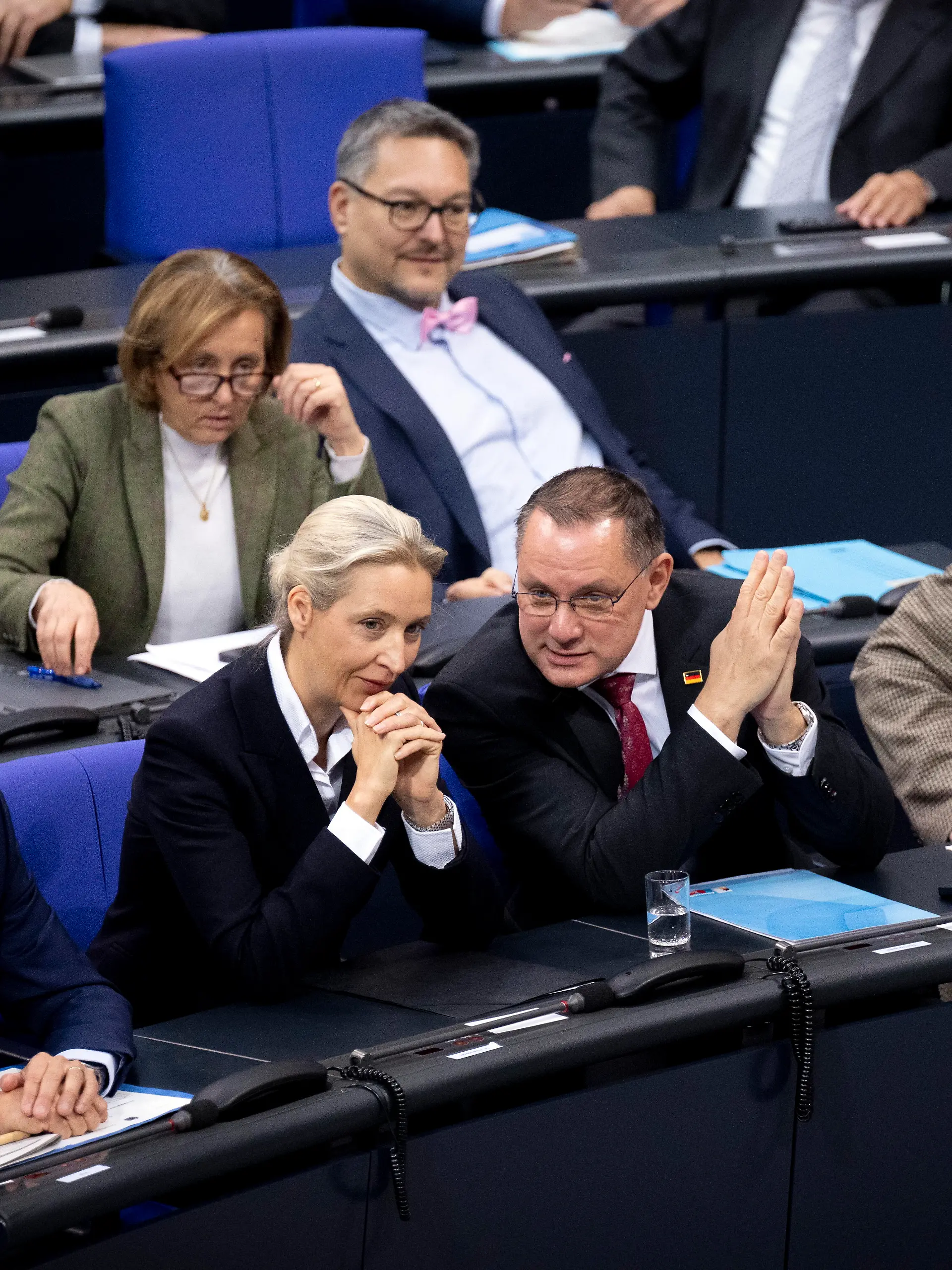 DEU, Deutschland, Germany, Berlin, 26.11.2025 Alice Weidel , Fraktionsvorsitzende der AfD Alternative fuer Deutschland mit Mitglieder der Fraktion Tino Chrupalla Alexander Gauland u.a. waehrend der Debatte zum Haushalt im Plenum , 43. Sitzung der 21. Legislaturperiode im Plenarsaal Deutscher Bundestag in Berlin Deutschland . Die Debatten ueber den Etat des Kanzleramts werden traditionell zur Generalaussprache ueber die Politik der Bundesregierung genutzt. en: Alice Weidel , parliamentary group leader of the AfD Alternative for Germany Alternative fuer Deutschland , with members of the parliamentary group Tino Chrupalla Alexander Gauland and others during the budget 43rd session of the 21st legislative period in the plenary hall of the German Bundestag in Berlin Germany . The debates about the Chancellor's Office budget are traditionally used as a general discussion about the policies of the Federal Government