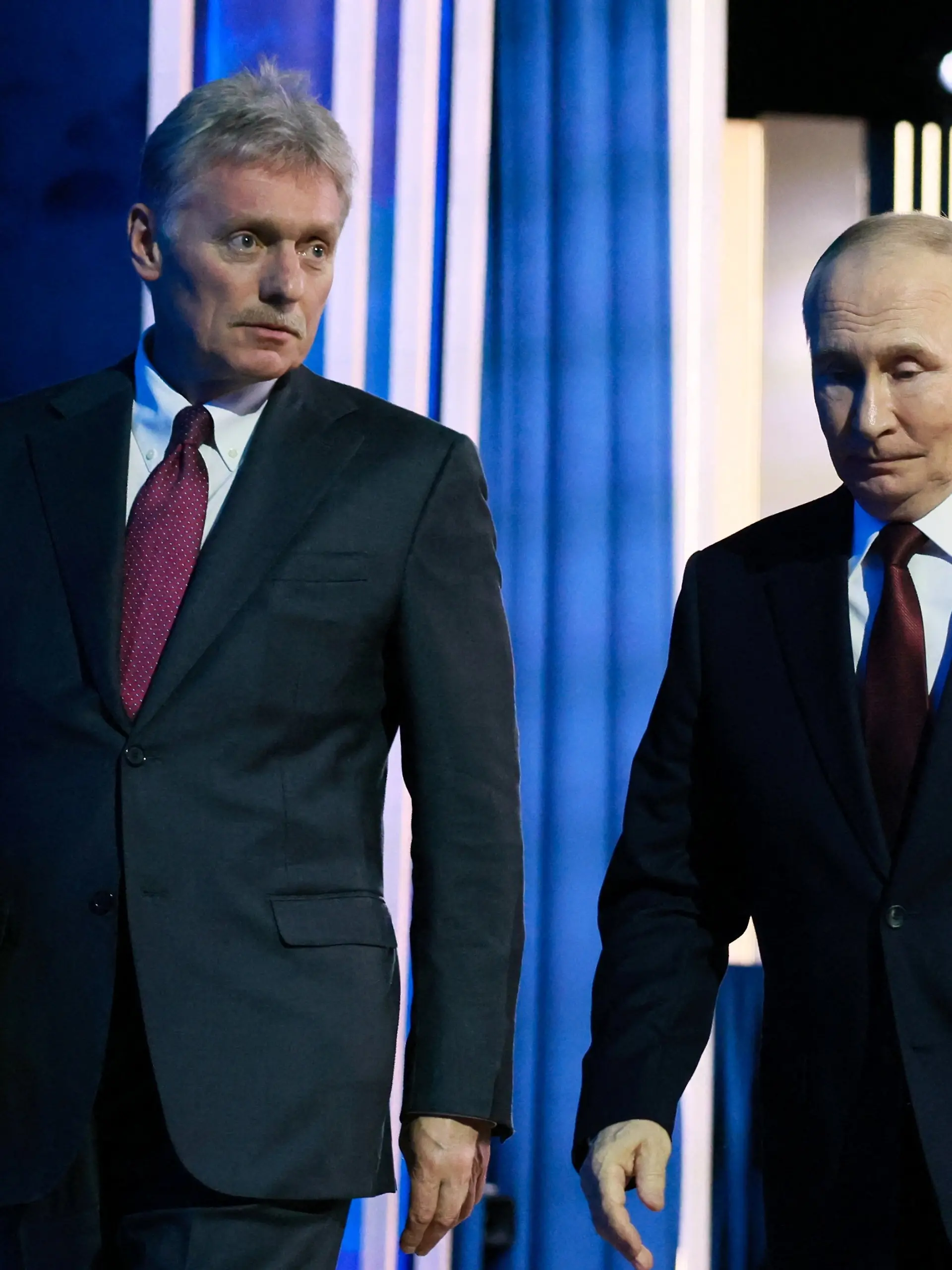 Russian President Vladimir Putin and Kremlin spokesman Dmitry Peskov leave after Putin's annual press conference and phone-in in Moscow, Russia December 19, 2025. Sputnik/Mikhail Metzel/Pool via REUTERS ATTENTION EDITORS - THIS IMAGE WAS PROVIDED BY A THIRD PARTY.