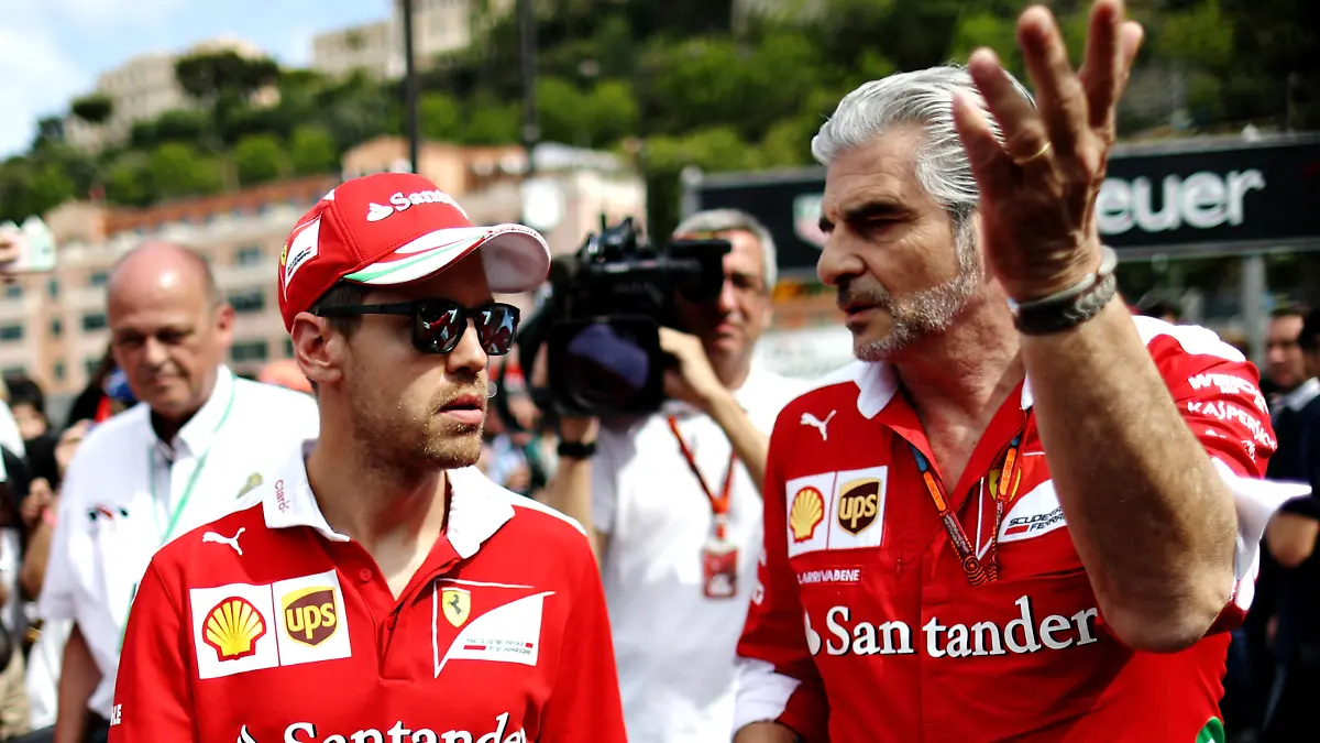 MONTE-CARLO, MONACO - MAY 27: Sebastian Vettel of Germany and Ferrari with Ferrari Team Principal Maurizio Arrivabene in the Pitlane during previews to the Monaco Formula One Grand Prix at Circuit de Monaco on May 27, 2016 in Monte-Carlo, Monaco. (Photo by Lars Baron/Getty Images)