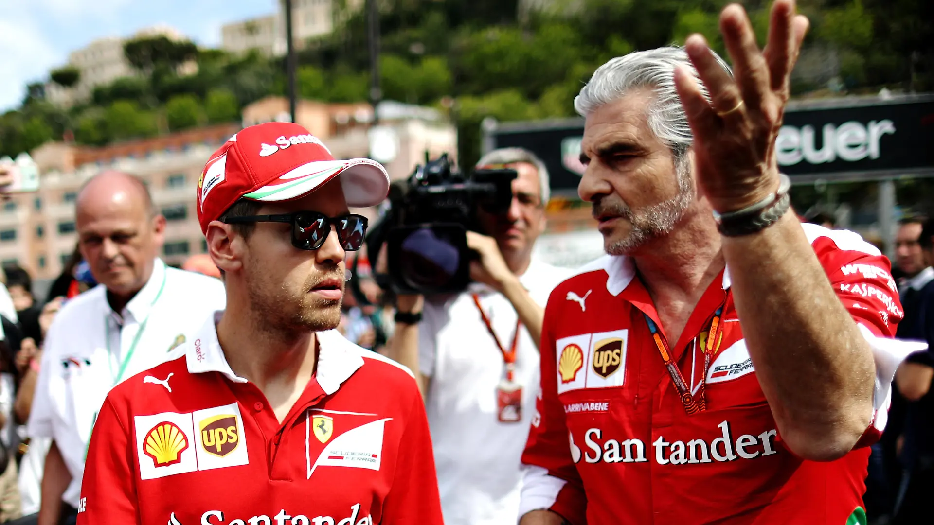 MONTE-CARLO, MONACO - MAY 27: Sebastian Vettel of Germany and Ferrari with Ferrari Team Principal Maurizio Arrivabene in the Pitlane during previews to the Monaco Formula One Grand Prix at Circuit de Monaco on May 27, 2016 in Monte-Carlo, Monaco. (Photo by Lars Baron/Getty Images)