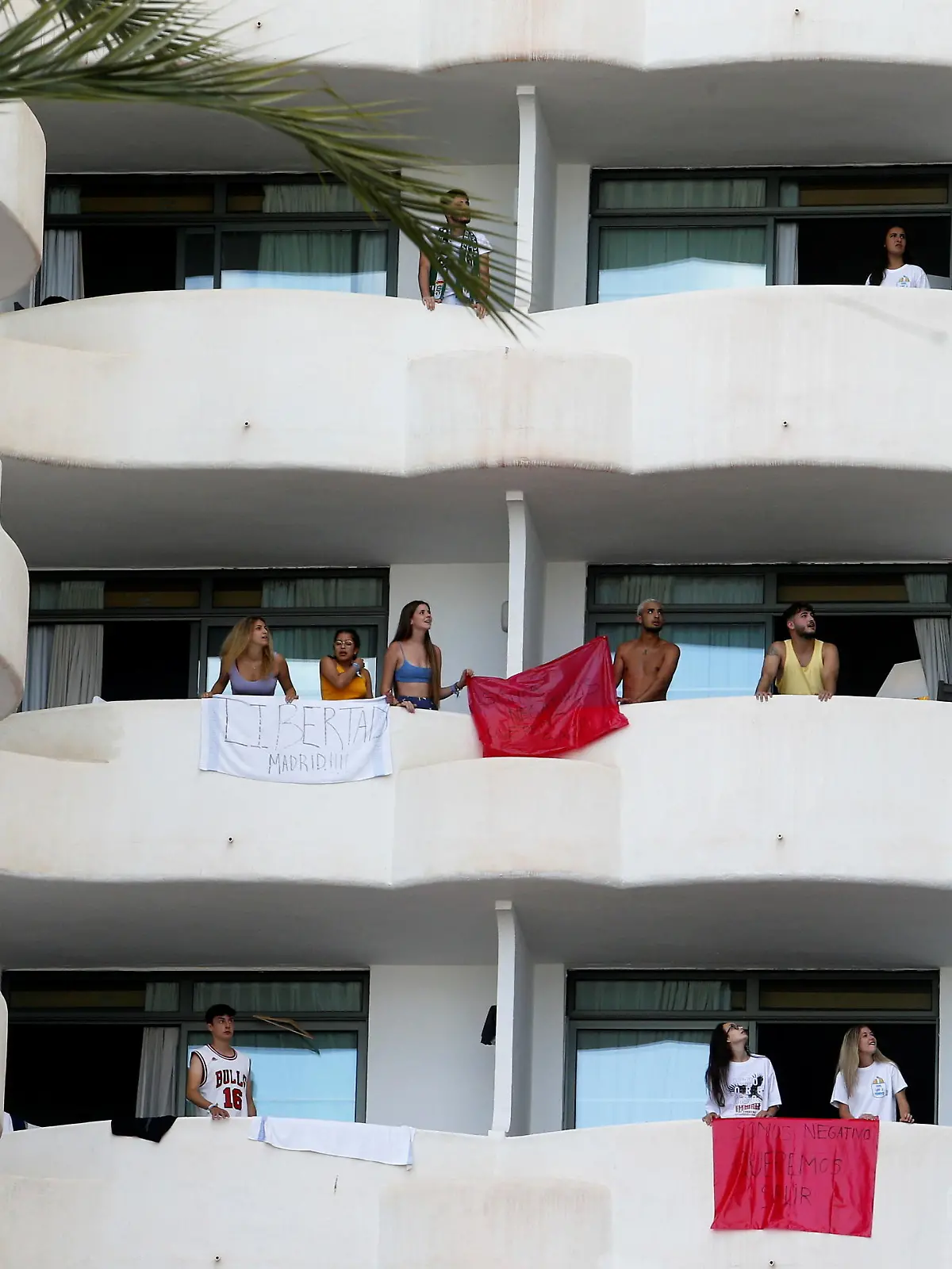 Students visiting from the mainland to celebrate the end of term are isolated in a hotel in Palma de Mallorca after testing positive for coronavirus disease (COVID-19) last week, in Mallorca, Spain, June 28, 2021. REUTERS/Enrique Calvo