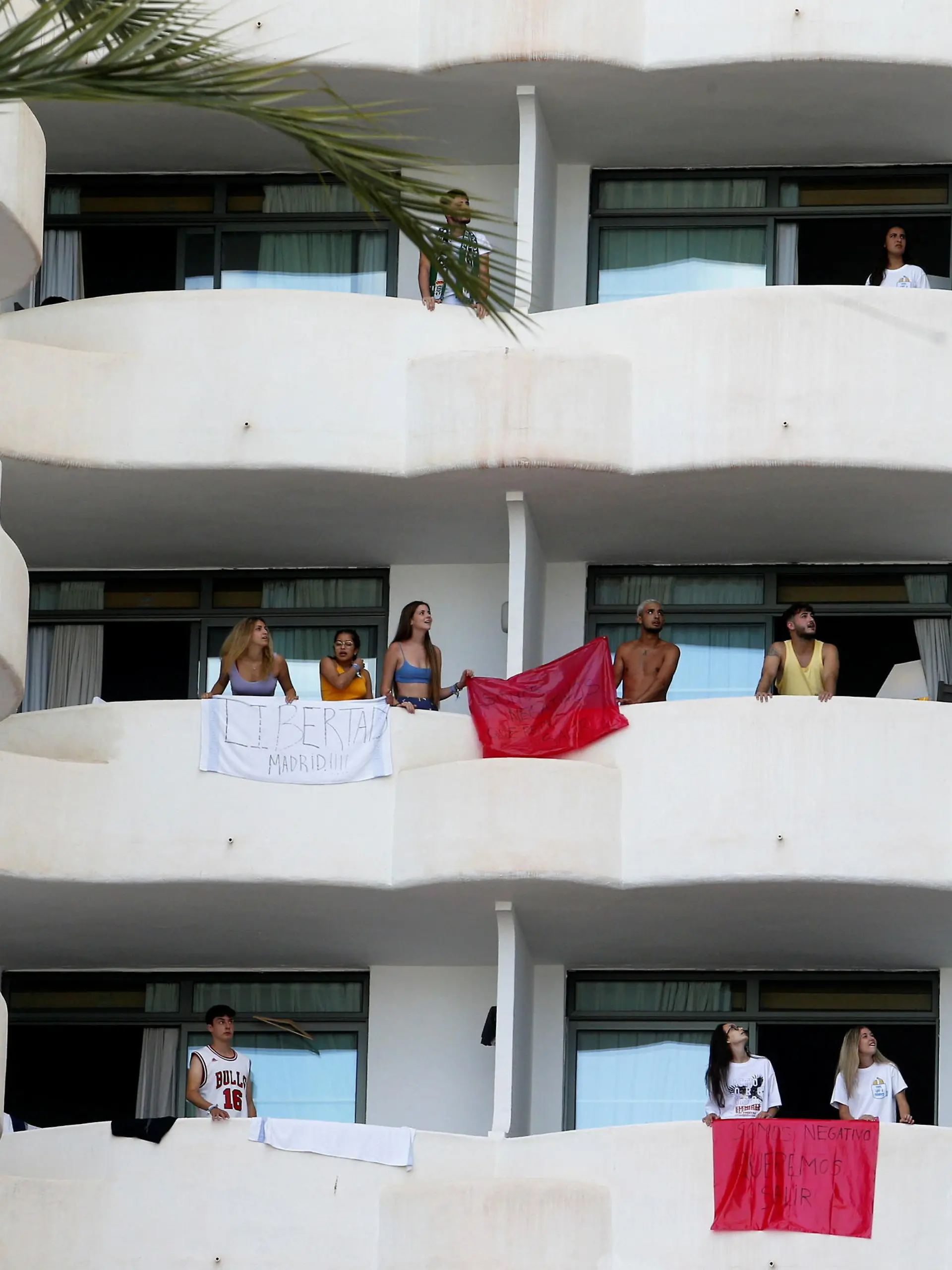 Students visiting from the mainland to celebrate the end of term are isolated in a hotel in Palma de Mallorca after testing positive for coronavirus disease (COVID-19) last week, in Mallorca, Spain, June 28, 2021. REUTERS/Enrique Calvo