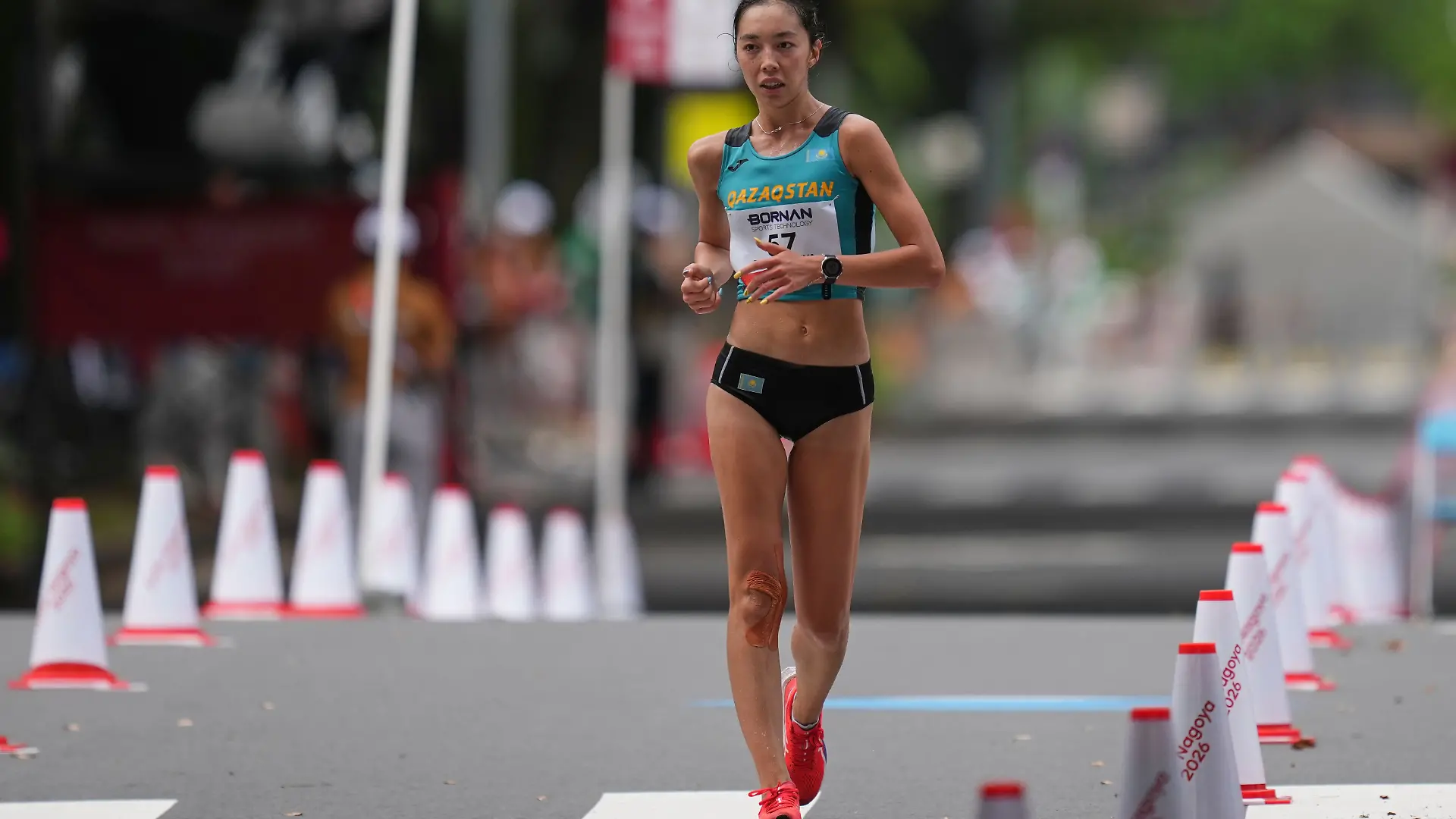 Kazakhstan’s Yasmina Toxanbayeva competes in the women’s marathon walk at the Asian Games in Nagoya, Japan, Sunday, Sept. 27, 2026. (AP Photo/Lee Jin-man)