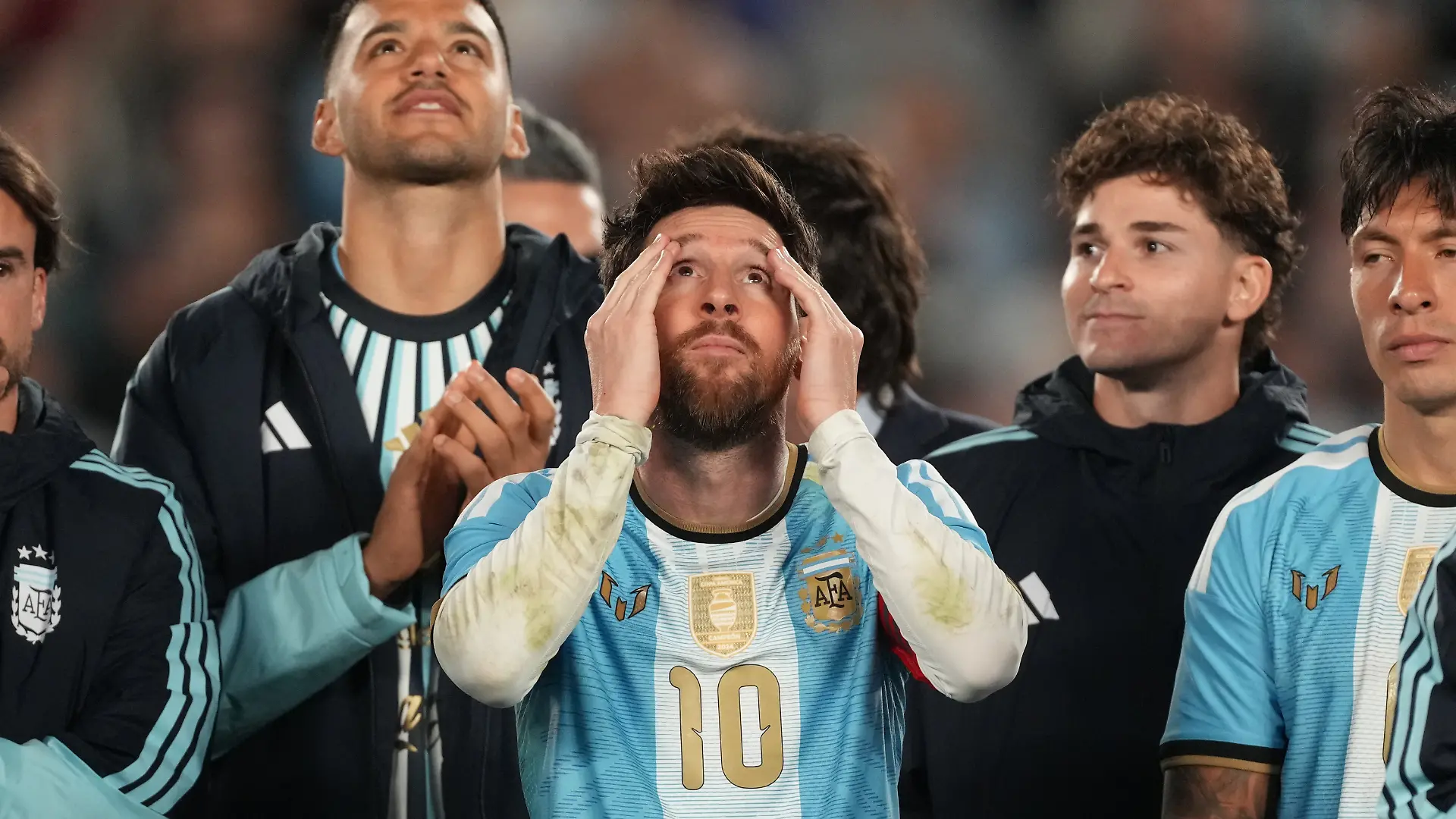 Argentina's Lionel Messi watches a drone show at the end of his final match for the national team, a soccer friendly against Benin, in Buenos Aires, Argentina, Tuesday, Oct.6, 2026. (AP/Photo/Gustavo Garello)