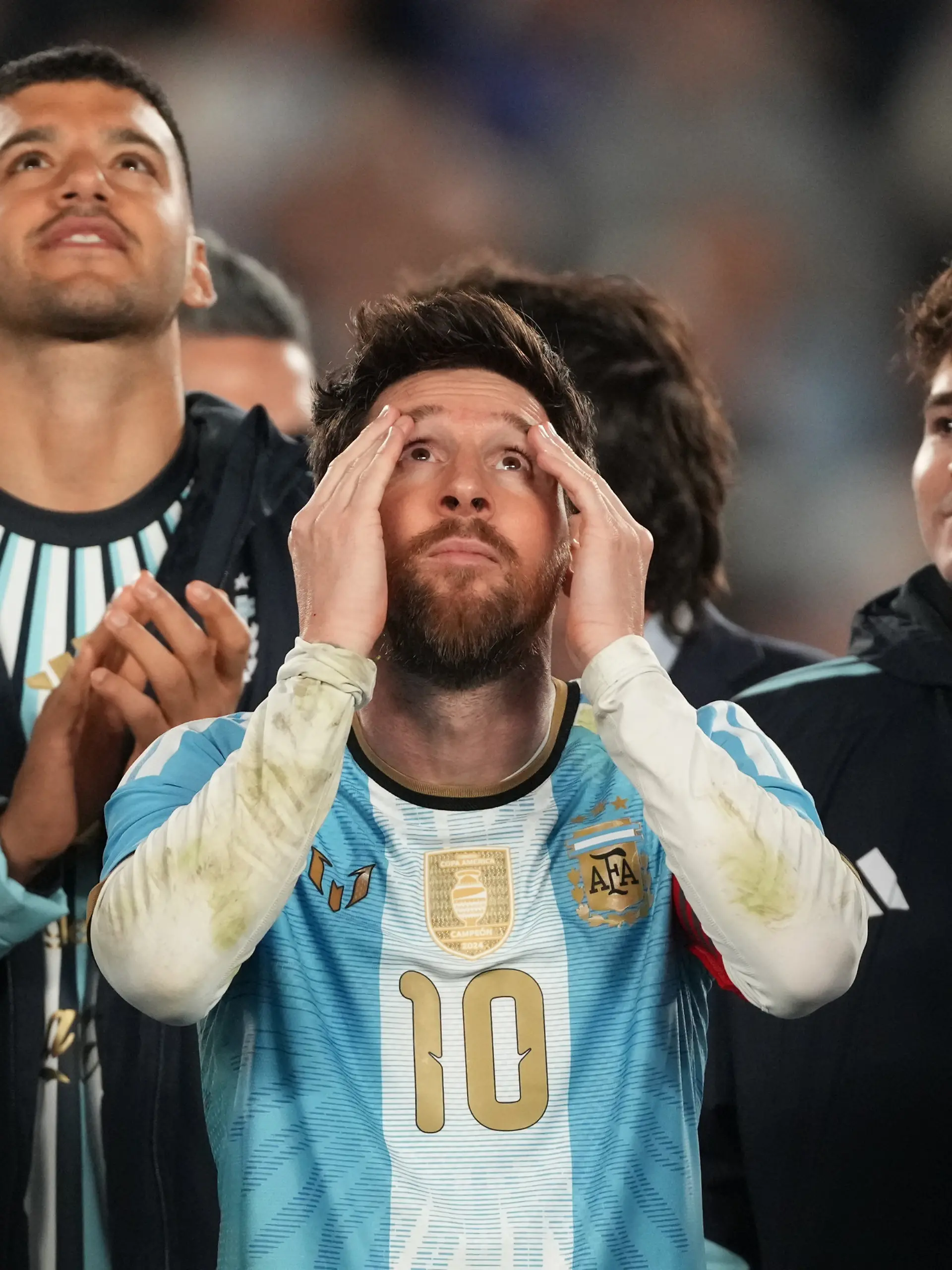 Argentina's Lionel Messi watches a drone show at the end of his final match for the national team, a soccer friendly against Benin, in Buenos Aires, Argentina, Tuesday, Oct.6, 2026. (AP/Photo/Gustavo Garello)