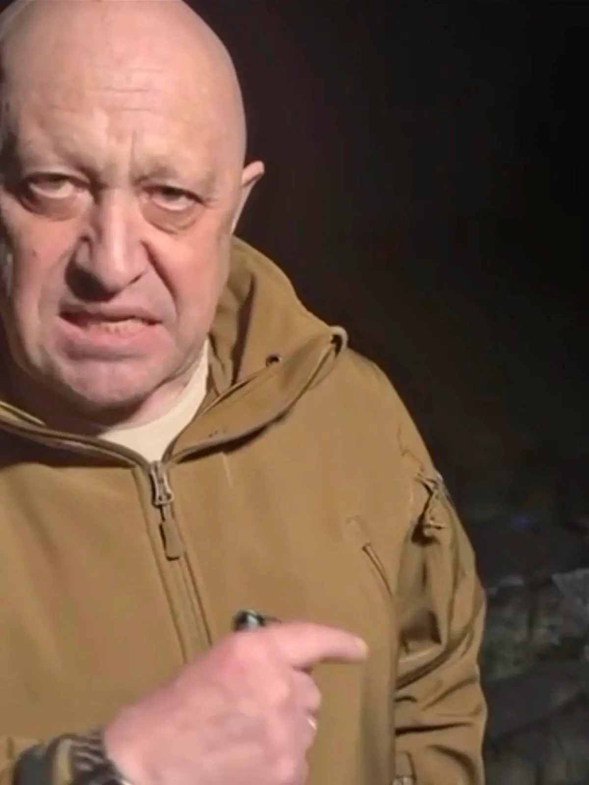 May 5, 2023, Bakhmut, Donetsk Oblast, Ukraine: Russian Yevgeny Prigozhin, owner of the Wagner Group of mercenaries, points to the bodies of his soldiers as he broadcasts a tirade against Russian Defense Minister Sergei Shoigu accusing the military command of starving his forces of ammunition and supplies, May 4, 2023 near Bakhmut, Ukraine. Prigozhin, standing in a field of bodies threatened to withdraw from the frontlines. Bakhmut Ukraine - ZUMAp138 20230505_zaa_p138_027 Copyright: xPoolx/WagnerxGroupx