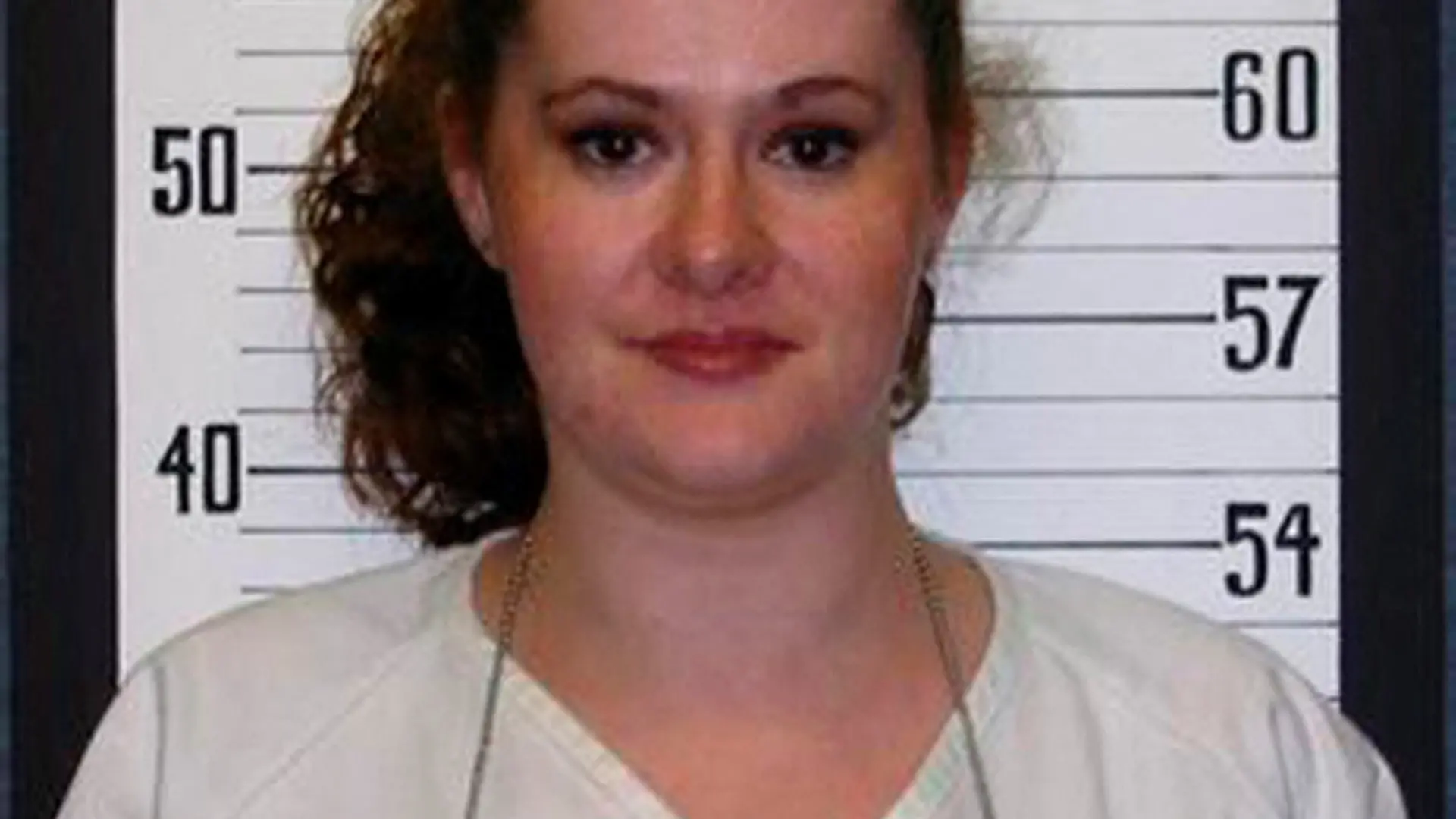 FILE PHOTO: Christa Gail Pike, 36, the only woman on Tennessee's Death Row, is pictured in this 2004 Tennessee Department of Correction booking photograph obtained by Reuters March 22, 2012. A prison guard and the boyfriend of Pike, have been charged in connection with a plan to break her out of the Tennessee Prison for Women in Nashville. A grand jury indicted 23-year-old Justin Heflin, previously a correctional officer at the Tennessee Prison for Women, on one count of bribery, one count of official misconduct, one count of conspiracy to commit escape and one count of facilitation to commit escape. Donald Kohut, 34, an acquaintance of Pike who frequently visited her in prison, was indicted on one count of bribery and one count of conspiracy to commit escape. REUTERS/Tennessee Department of Correction/Handout (UNITED STATES - Tags: CRIME LAW SOCIETY) FOR EDITORIAL USE ONLY. NOT FOR SALE FOR MARKETING OR ADVERTISING CAMPAIGNS. THIS IMAGE HAS BEEN SUPPLIED BY A THIRD PARTY. IT IS DISTRIBUTED, EXACTLY AS RECEIVED BY REUTERS, AS A SERVICE TO CLIENTS/File Photo
